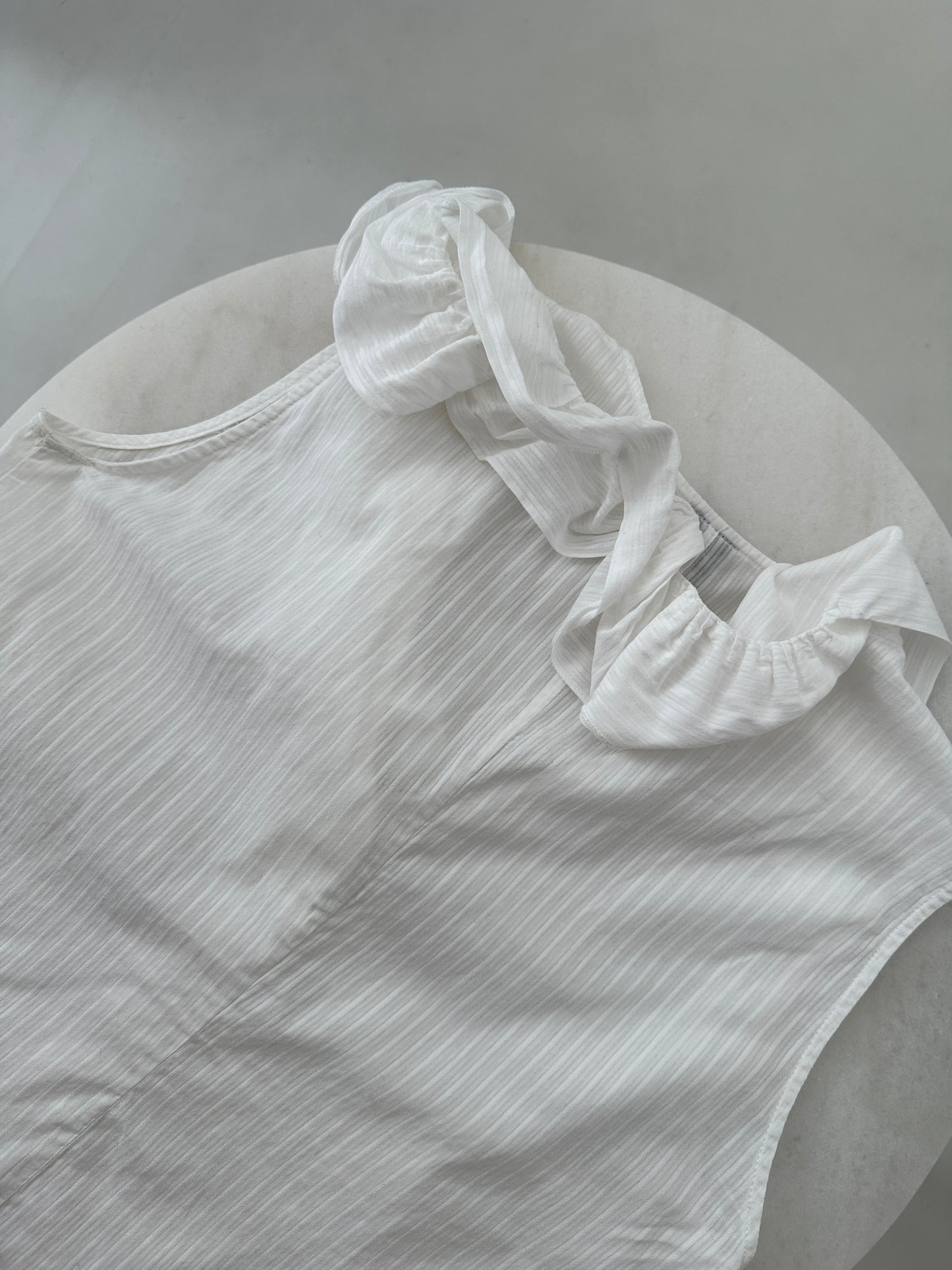 Ferré white blouse with asymmetric ruffle detail