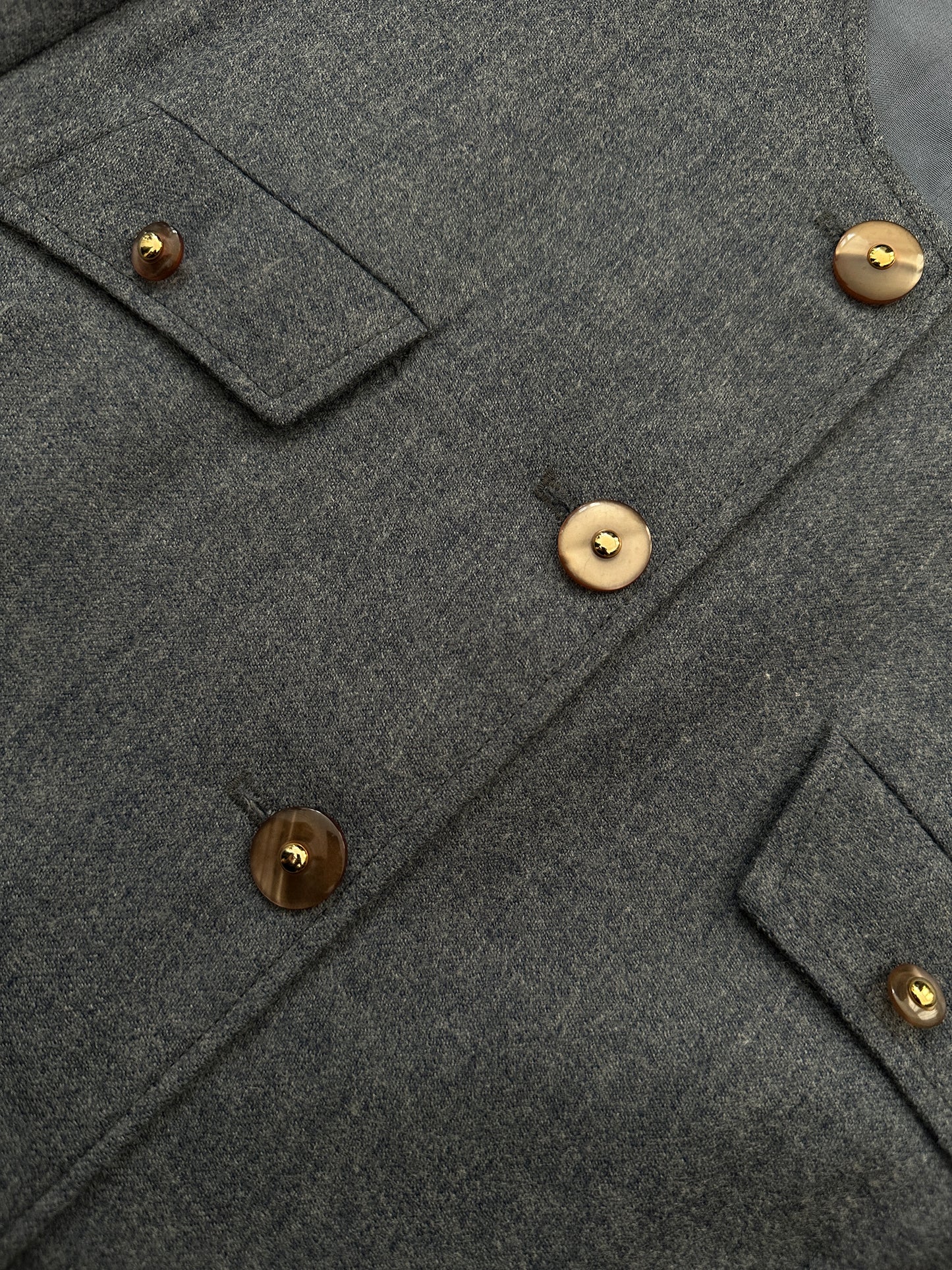 Tailored collarless wool jacket