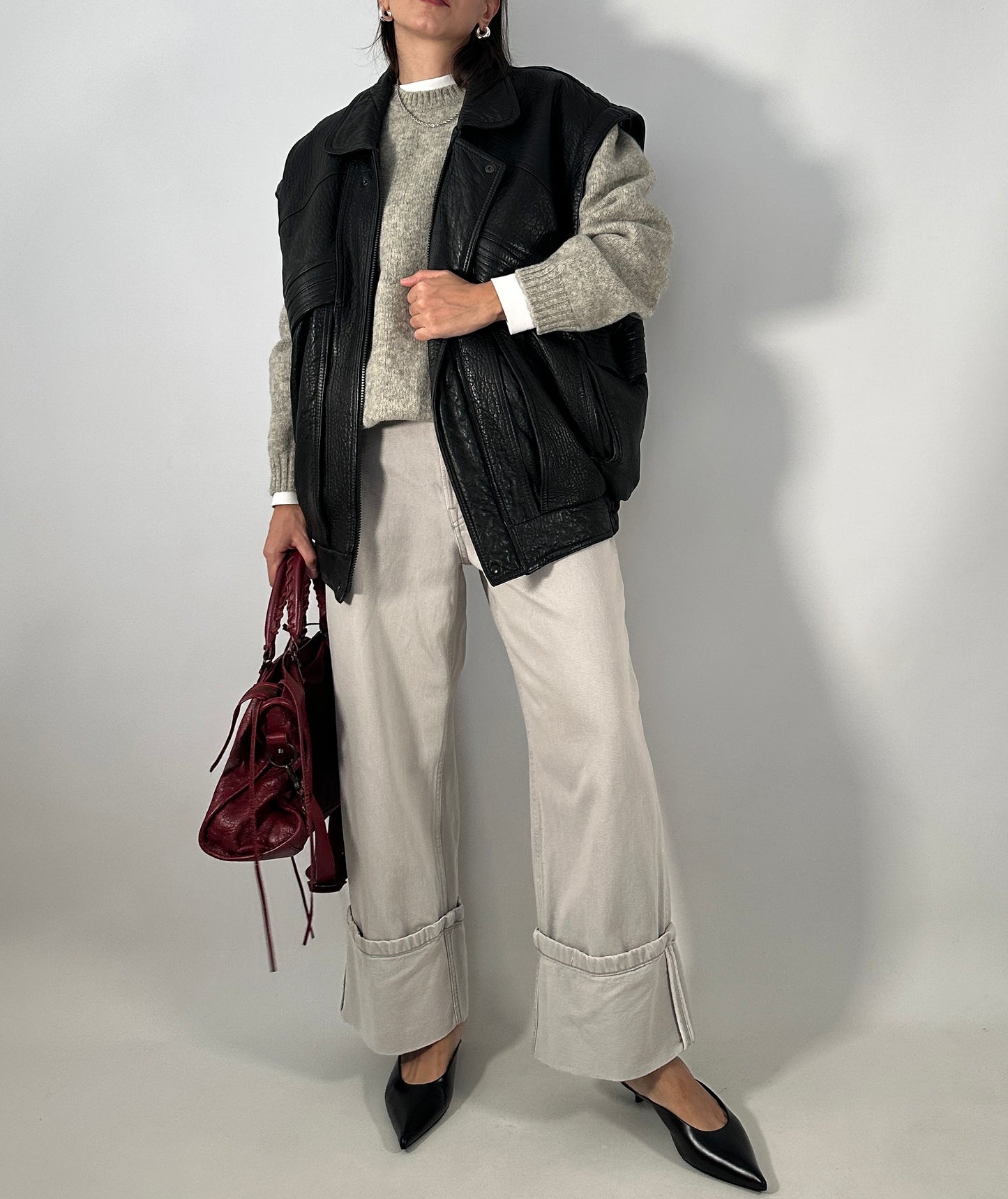 Vintage leather bomber jacket with detachable sleeves