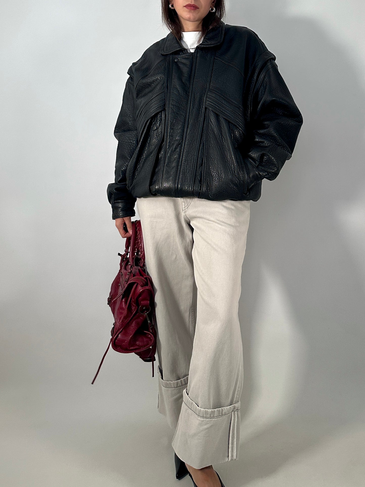 Vintage leather bomber jacket with detachable sleeves