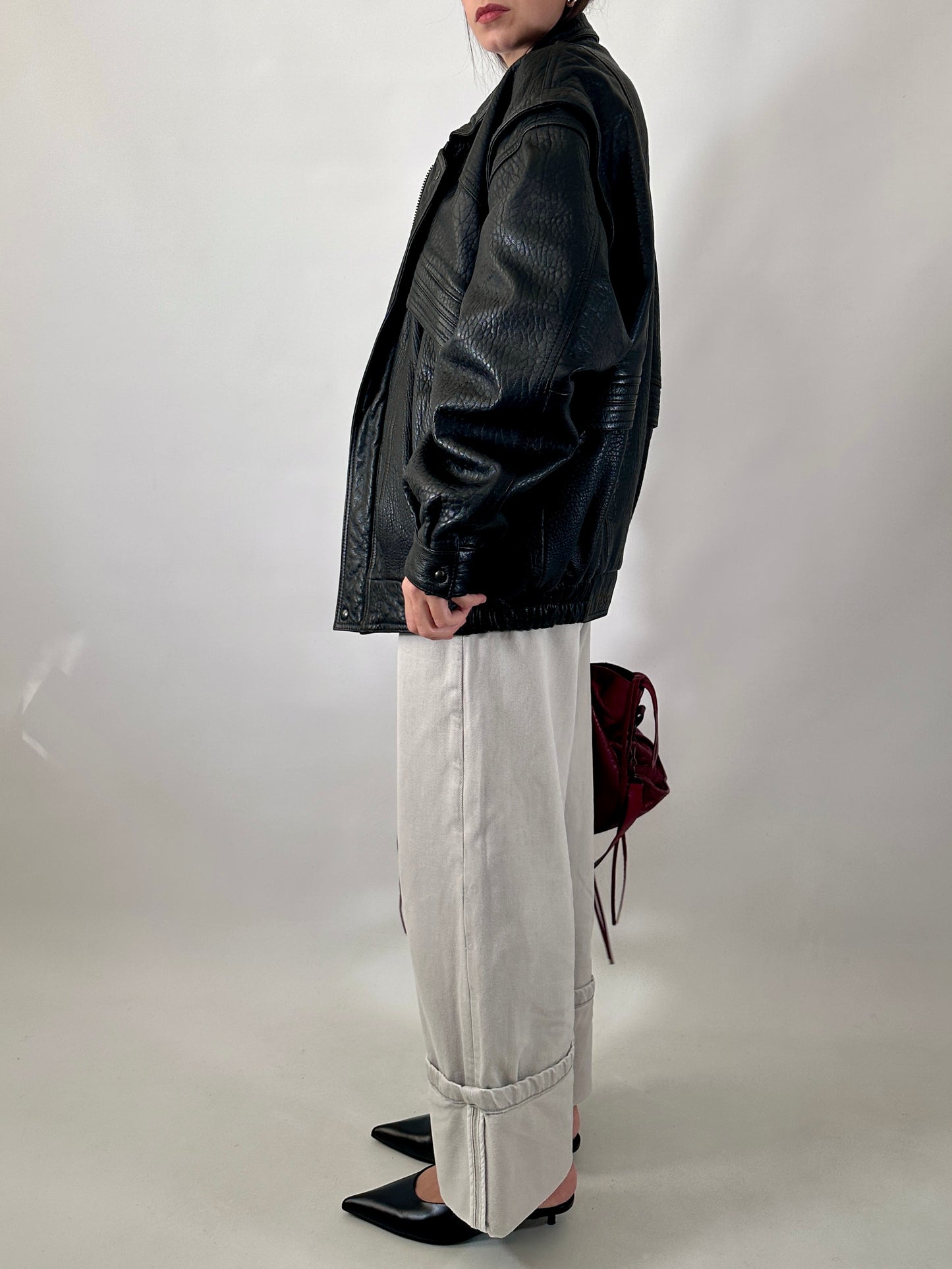 Vintage leather bomber jacket with detachable sleeves