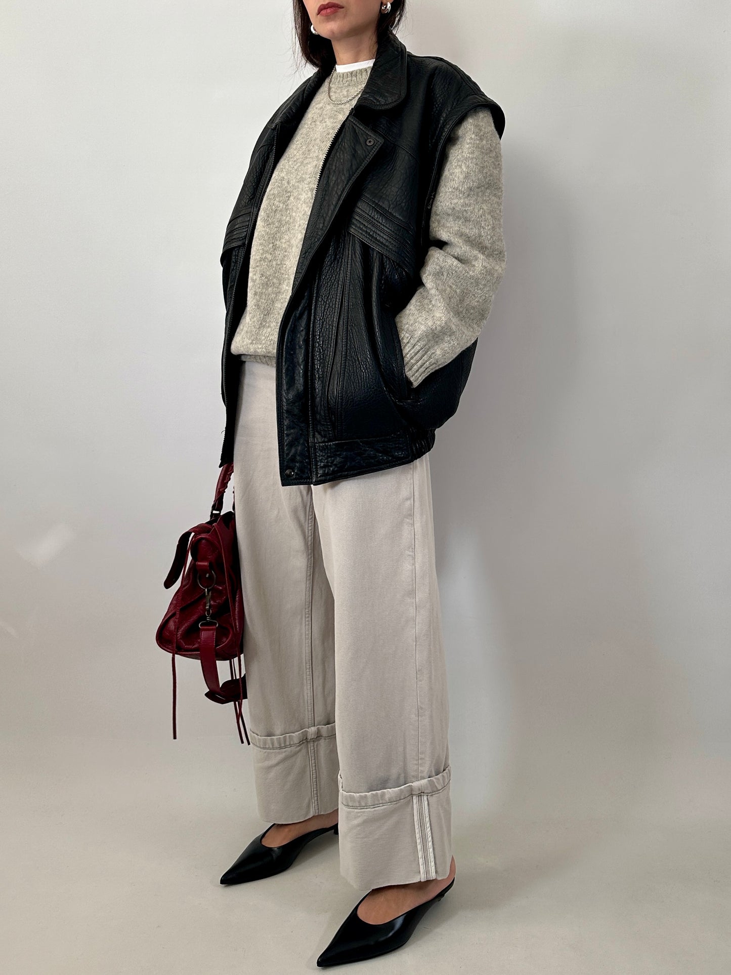 Vintage leather bomber jacket with detachable sleeves