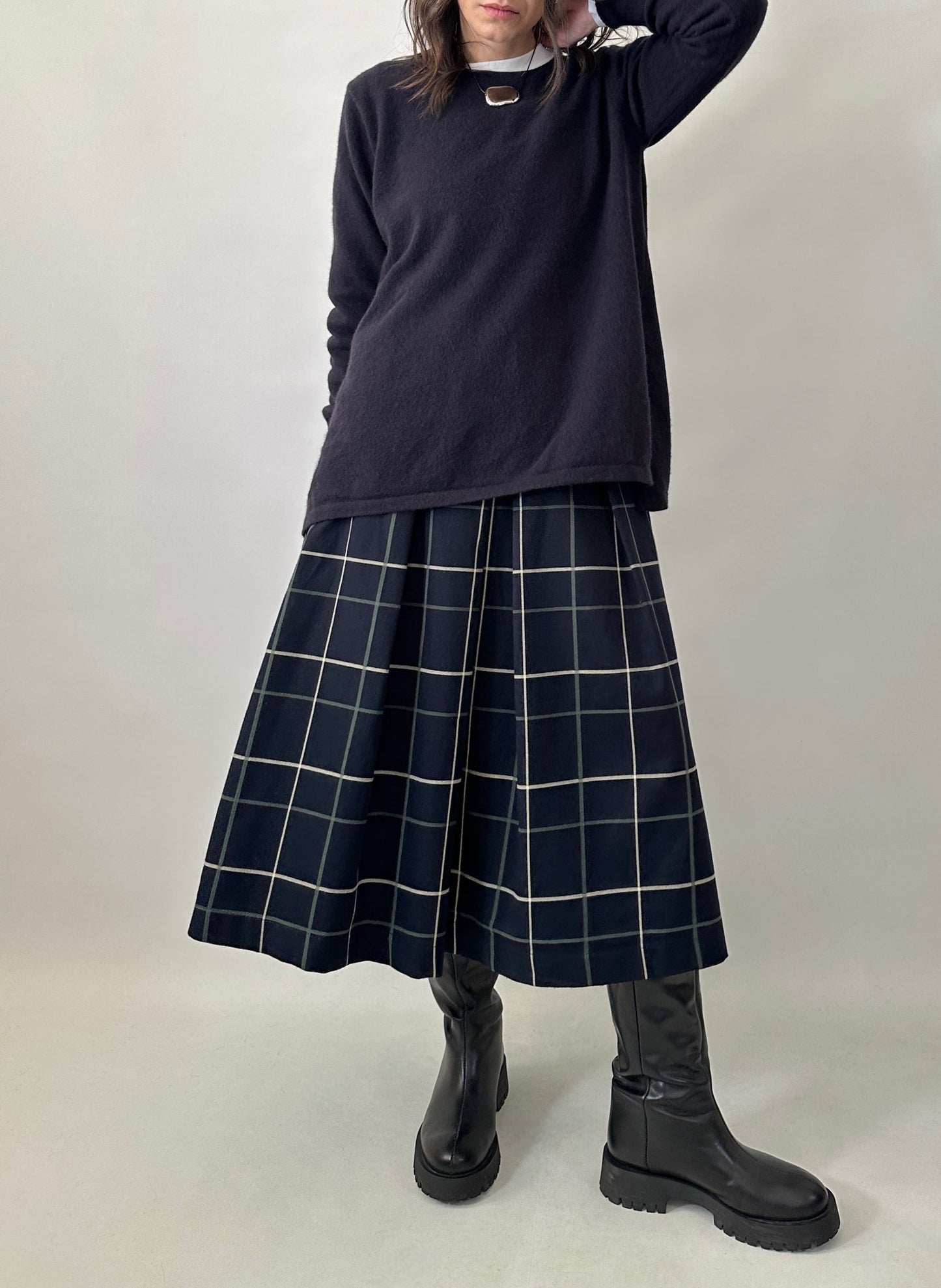 Checked pleated midi skirt