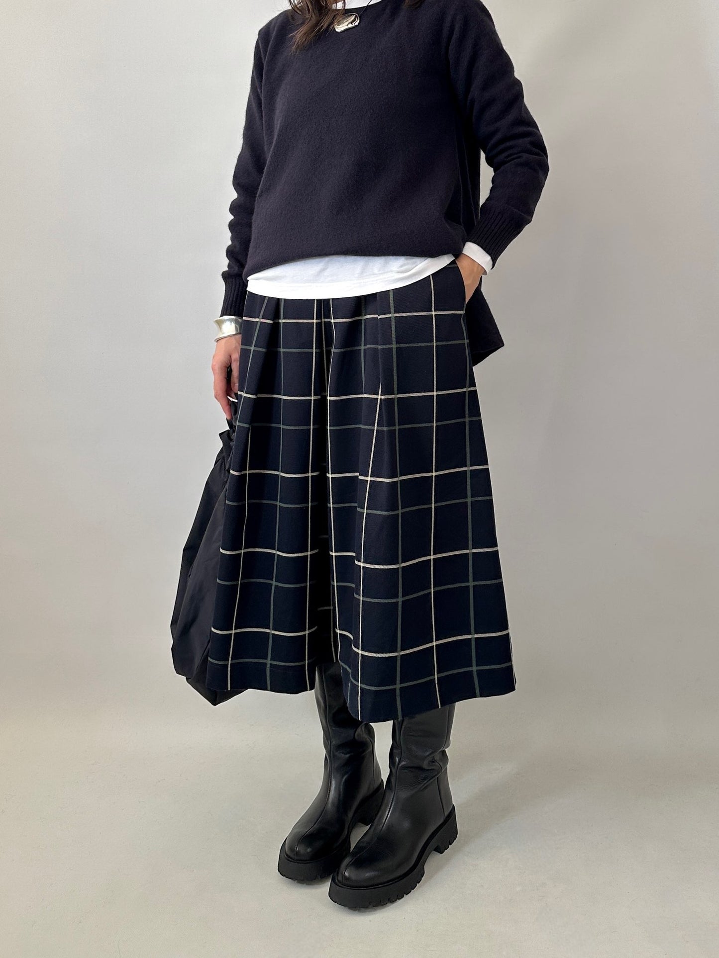 Checked pleated midi skirt
