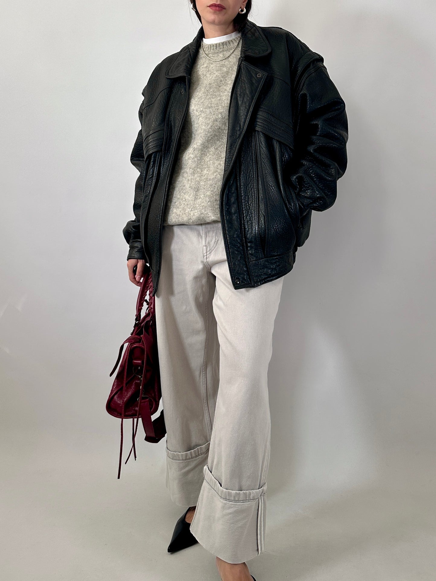 Vintage leather bomber jacket with detachable sleeves