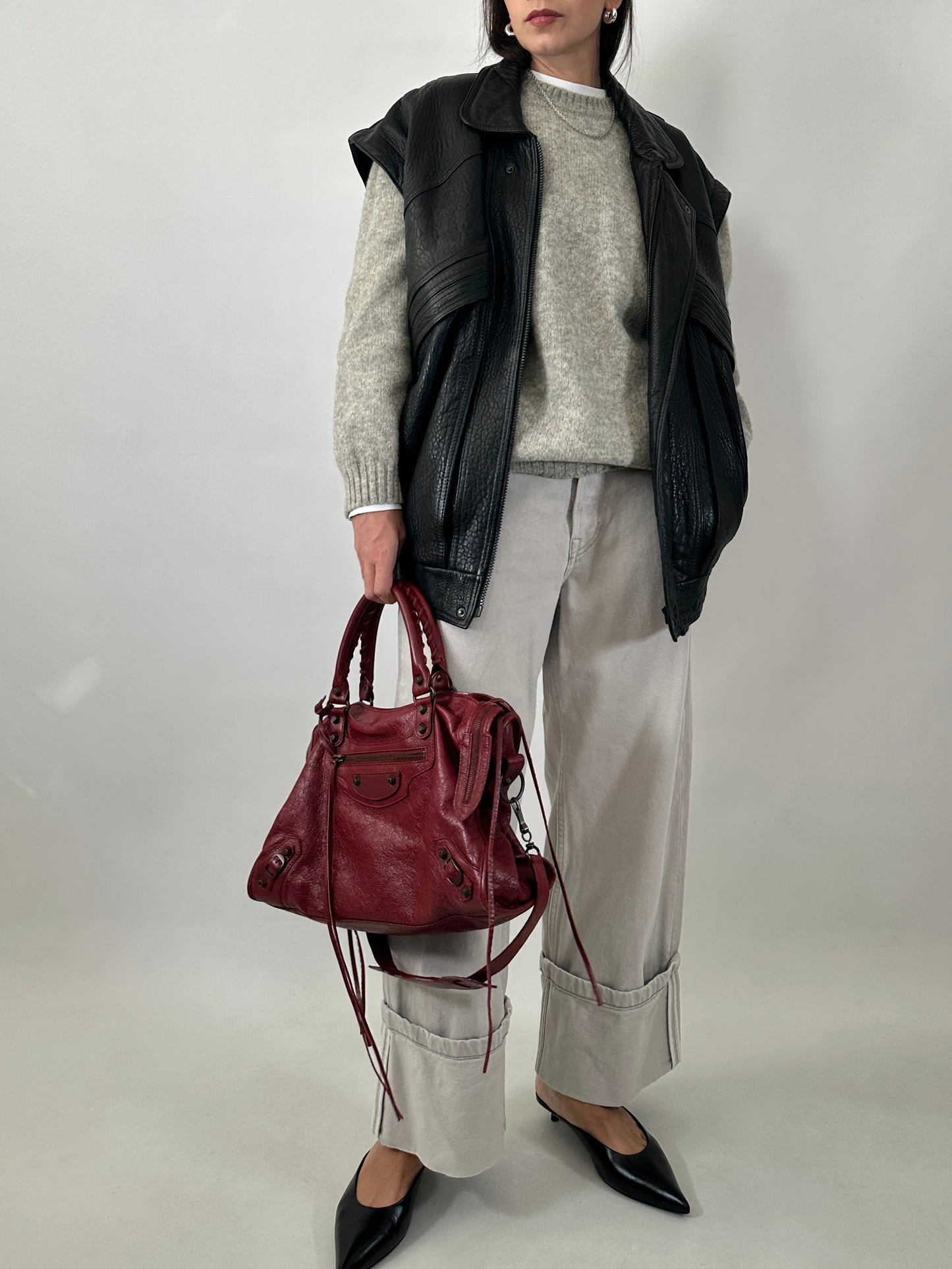 Vintage leather bomber jacket with detachable sleeves