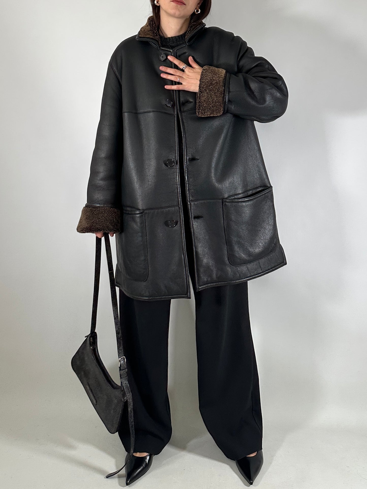 Authentic vintage shearling coat in black and brown