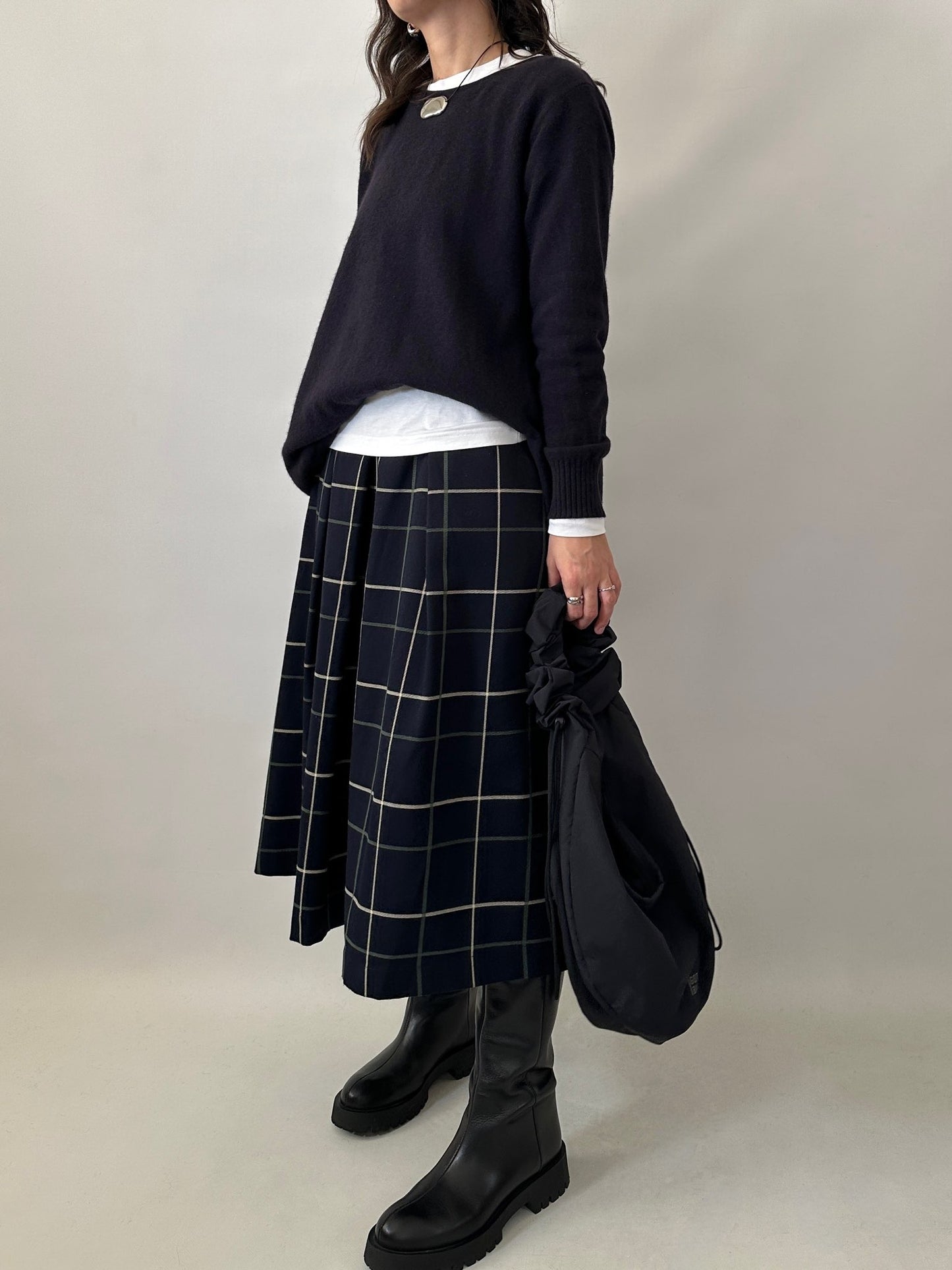 Checked pleated midi skirt