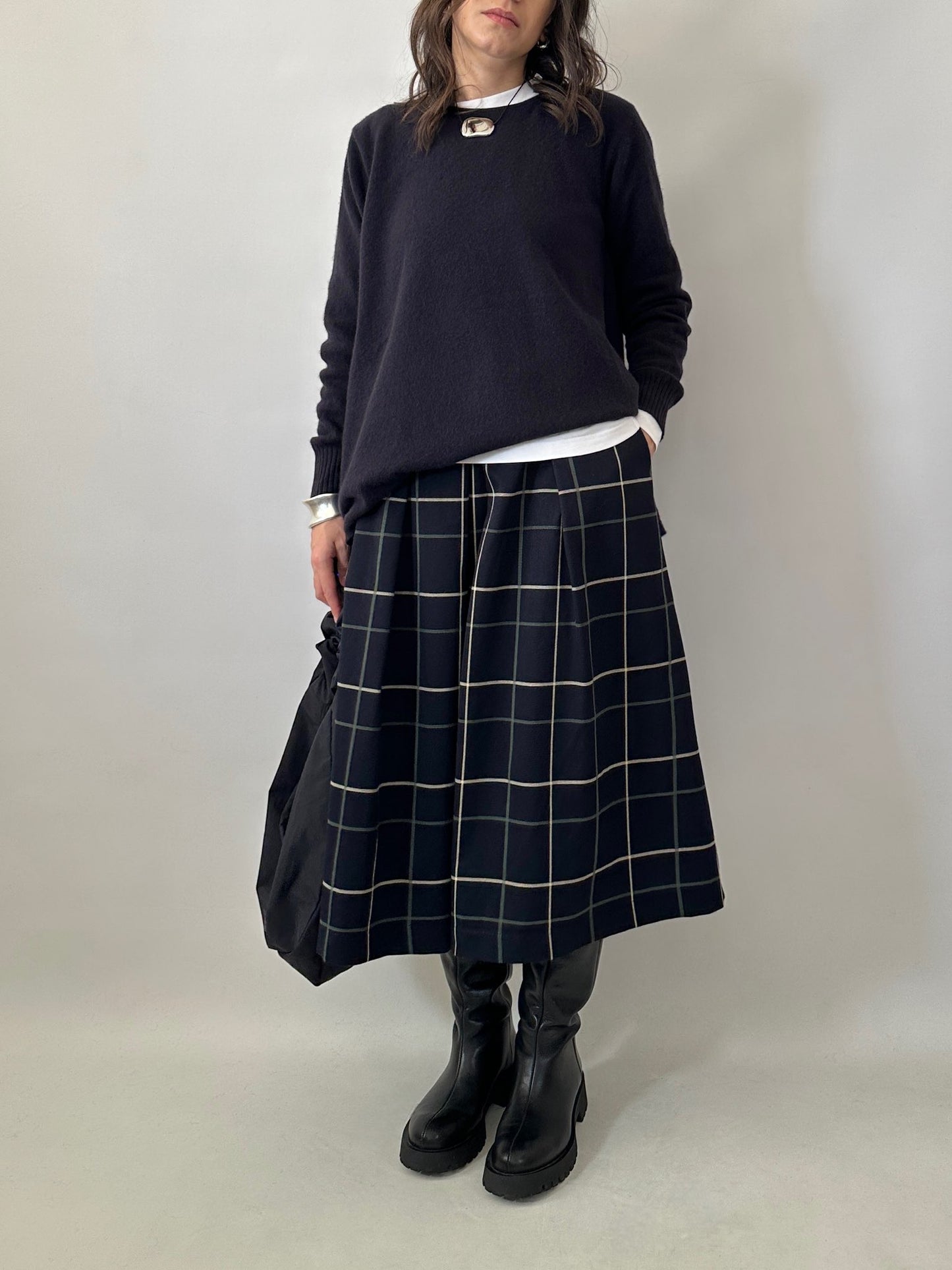 Checked pleated midi skirt