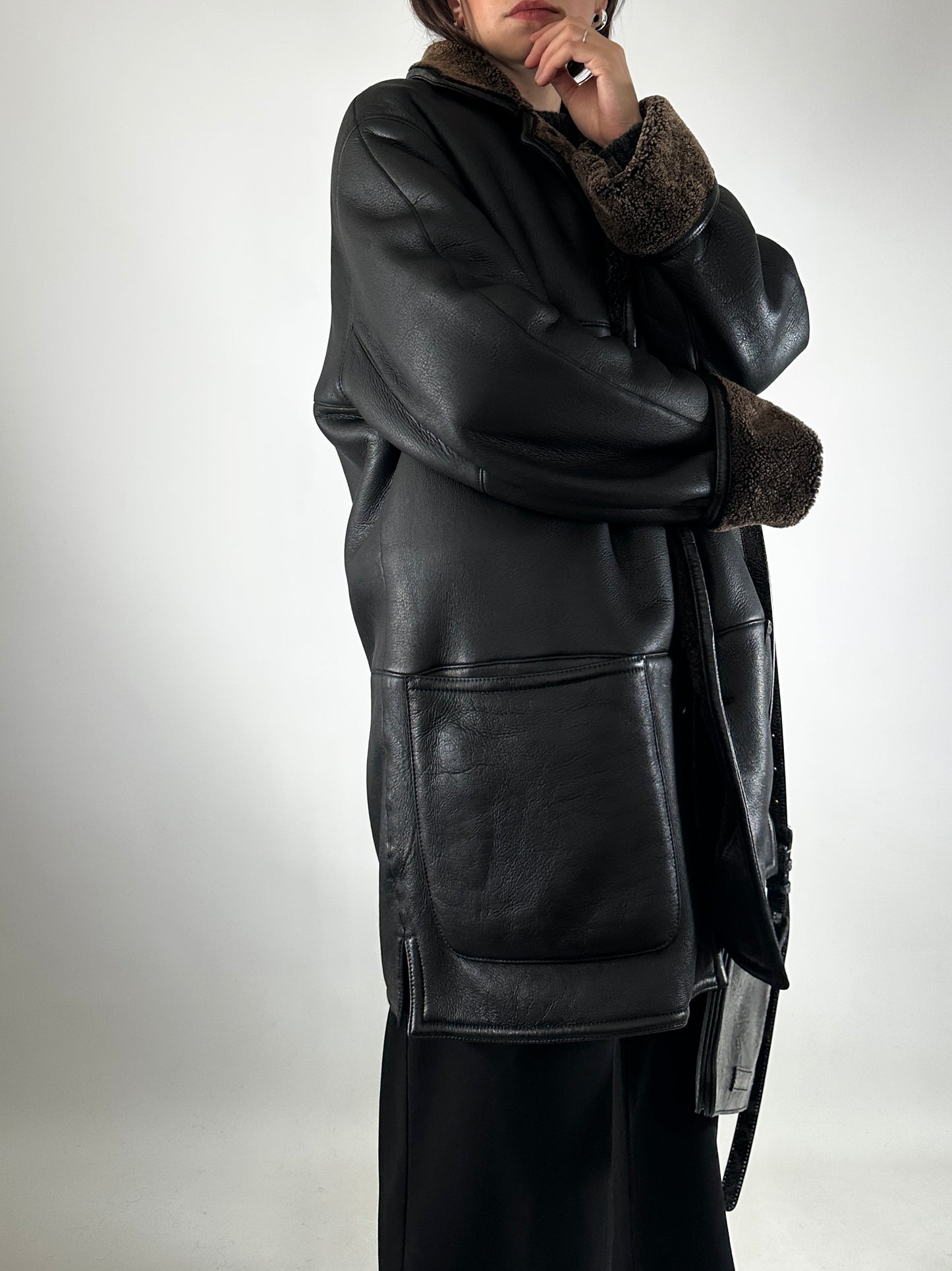 Authentic vintage shearling coat in black and brown