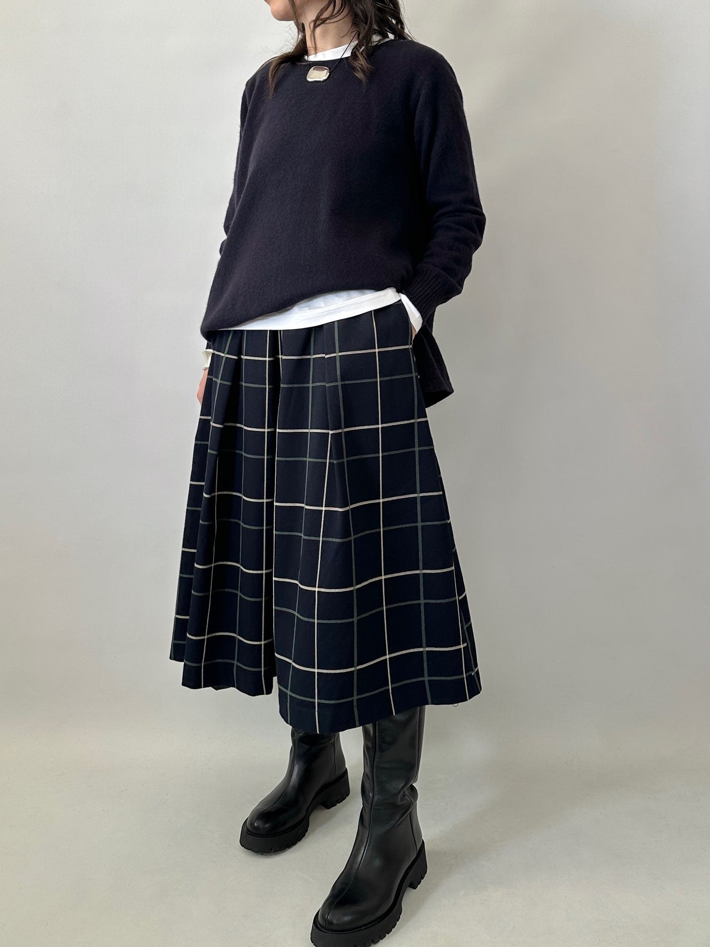 Checked pleated midi skirt