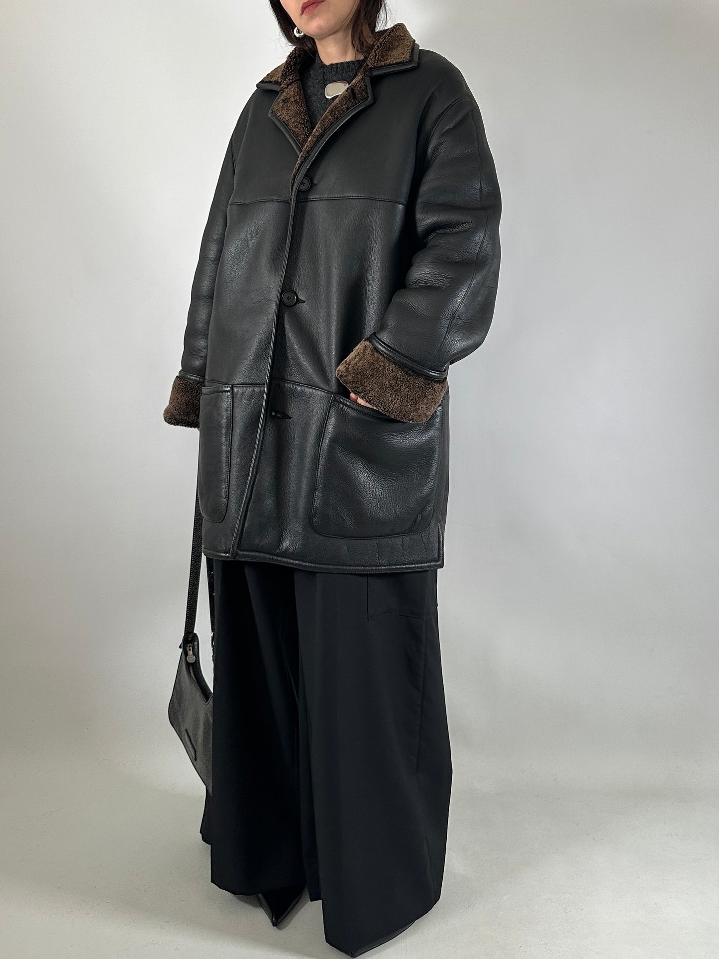 Authentic vintage shearling coat in black and brown