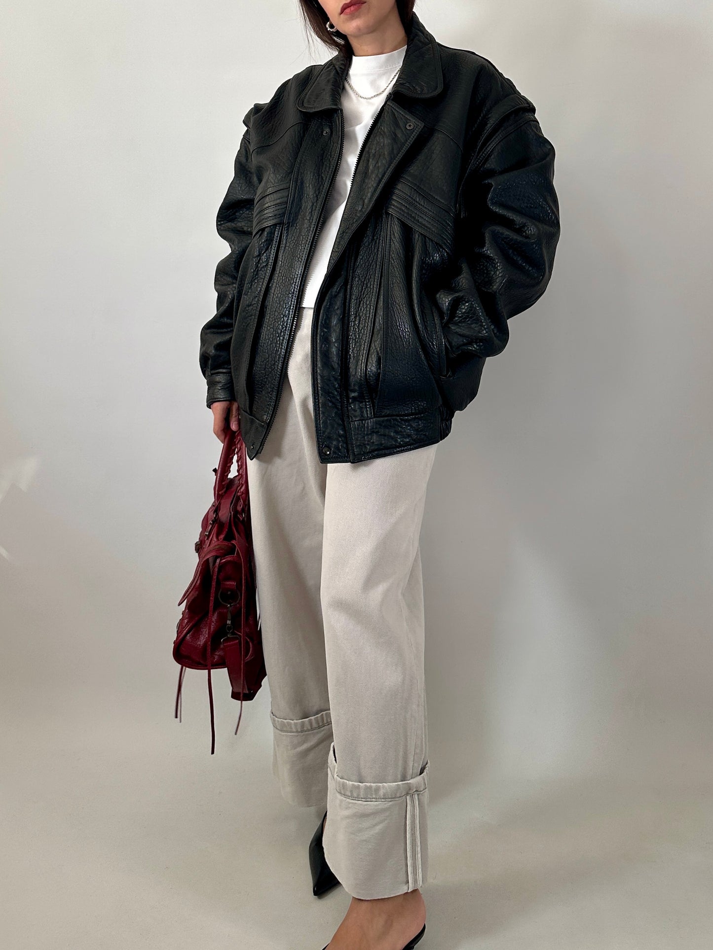 Vintage leather bomber jacket with detachable sleeves