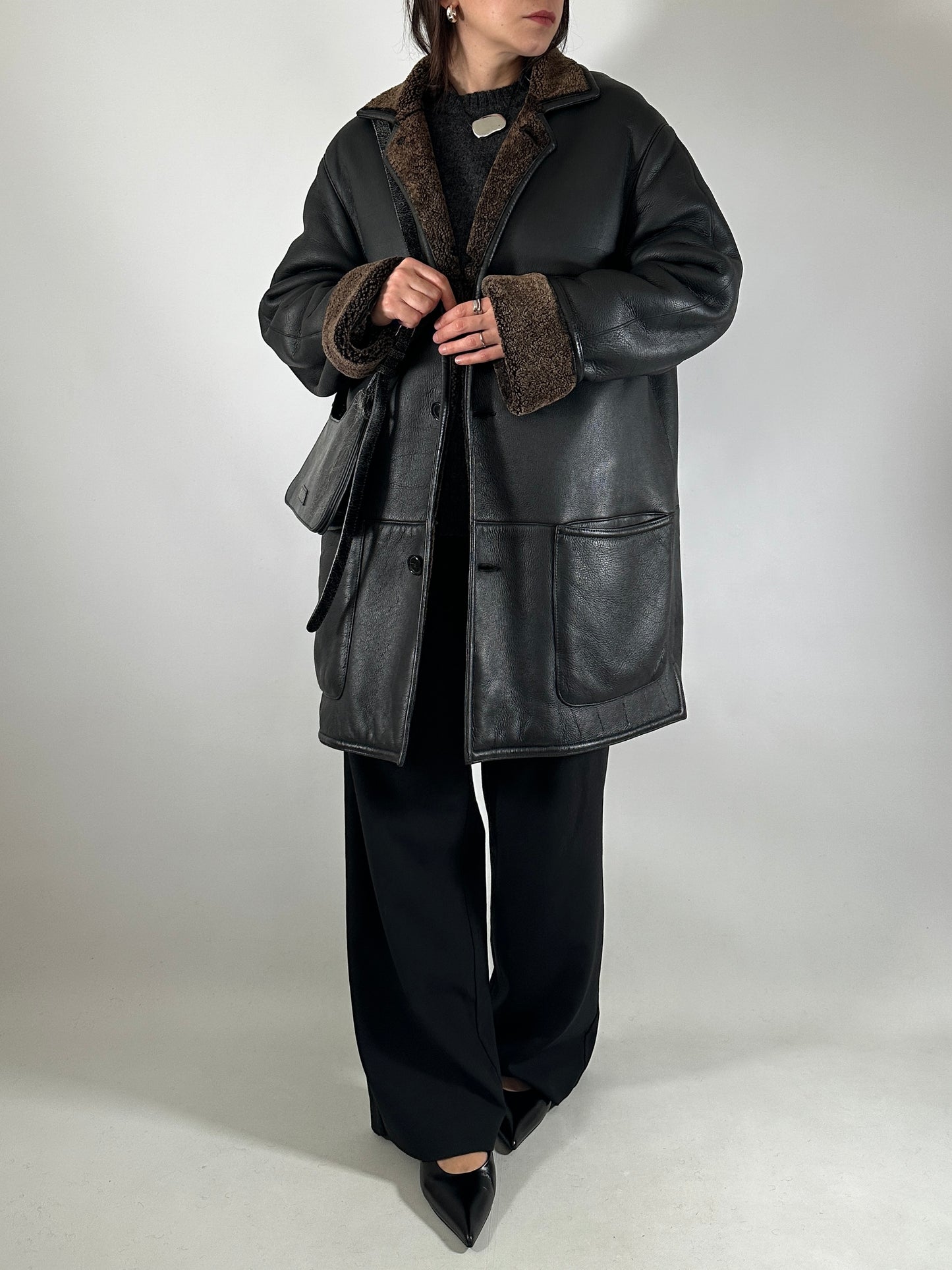 Authentic vintage shearling coat in black and brown