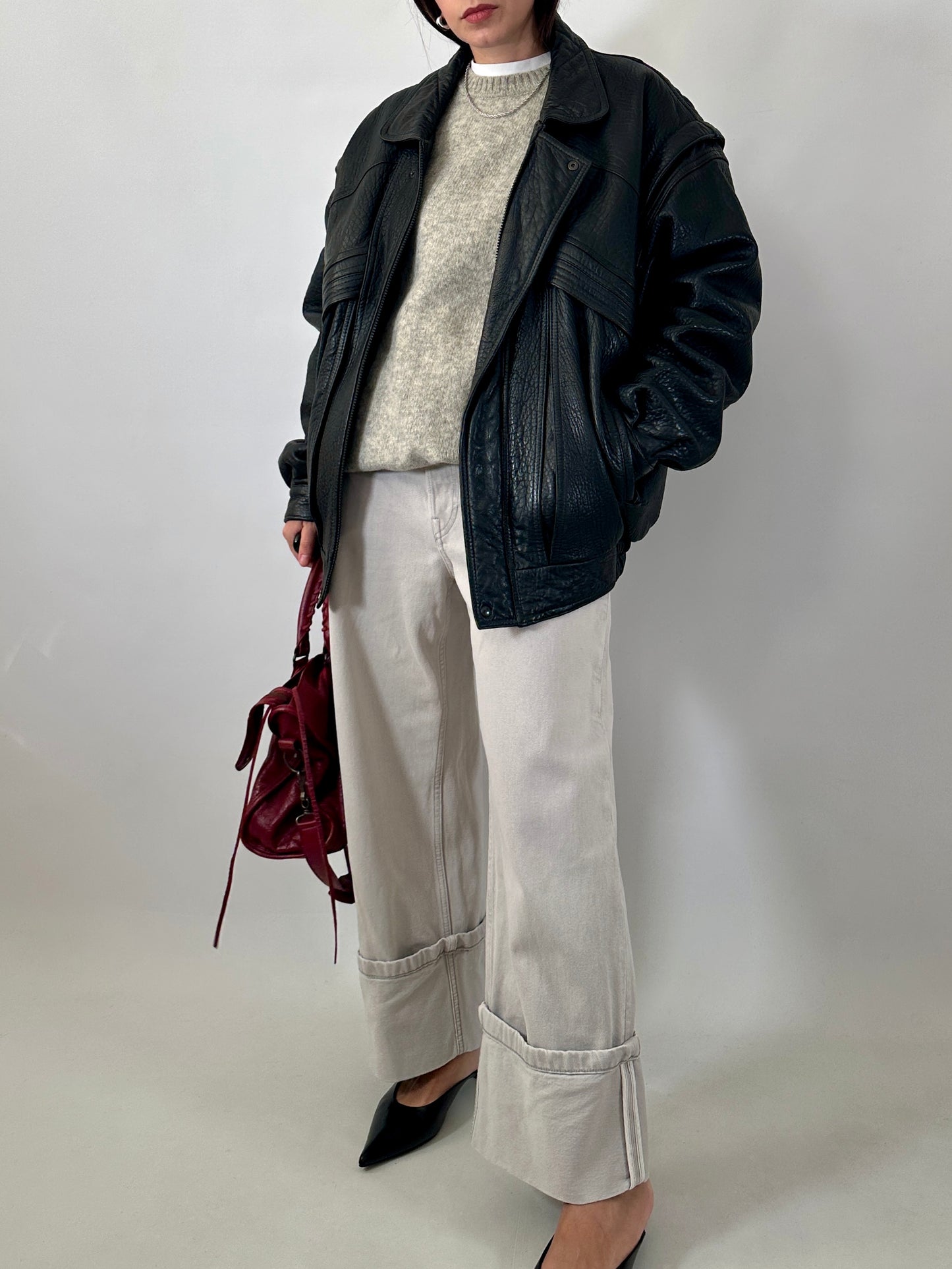 Vintage leather bomber jacket with detachable sleeves