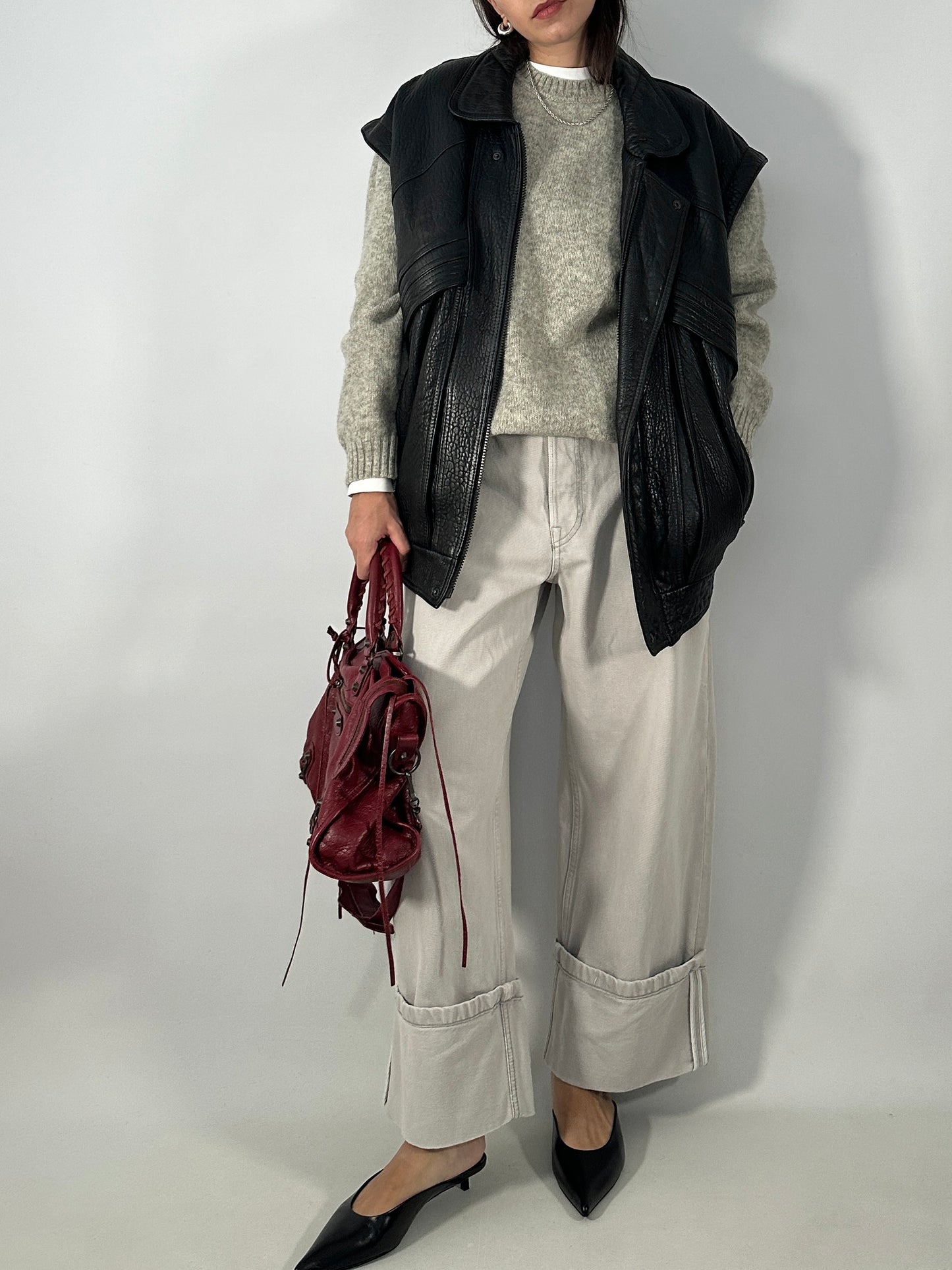 Vintage leather bomber jacket with detachable sleeves