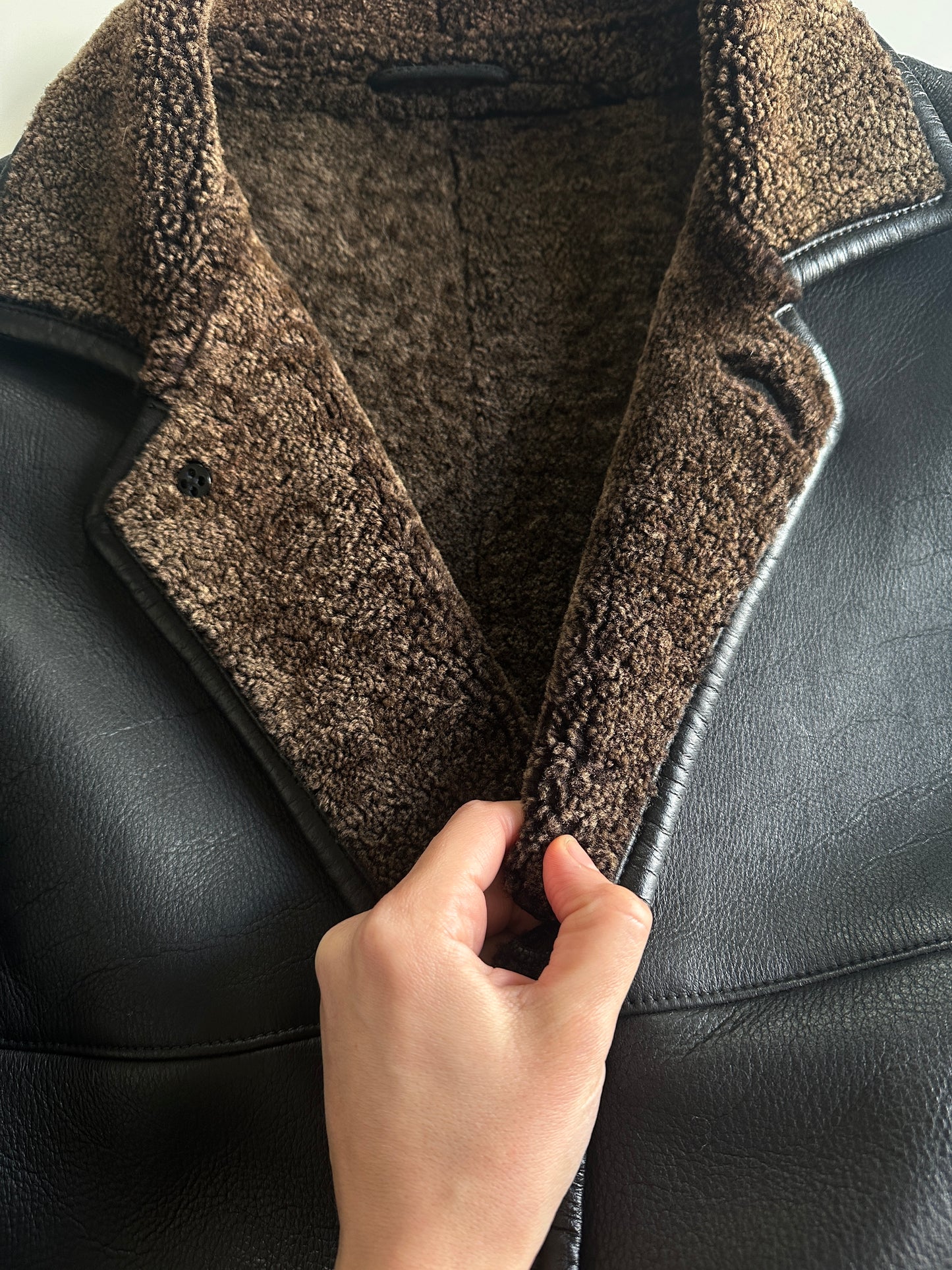 Authentic vintage shearling coat in black and brown
