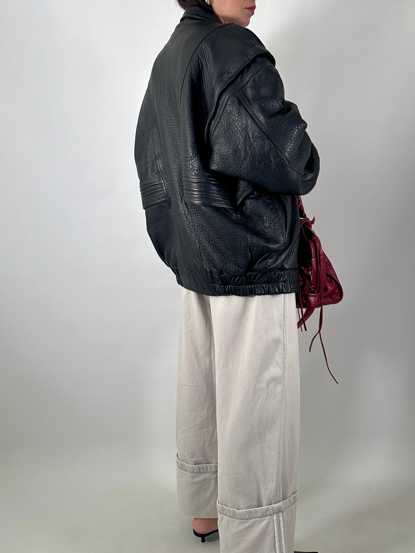 Vintage leather bomber jacket with detachable sleeves