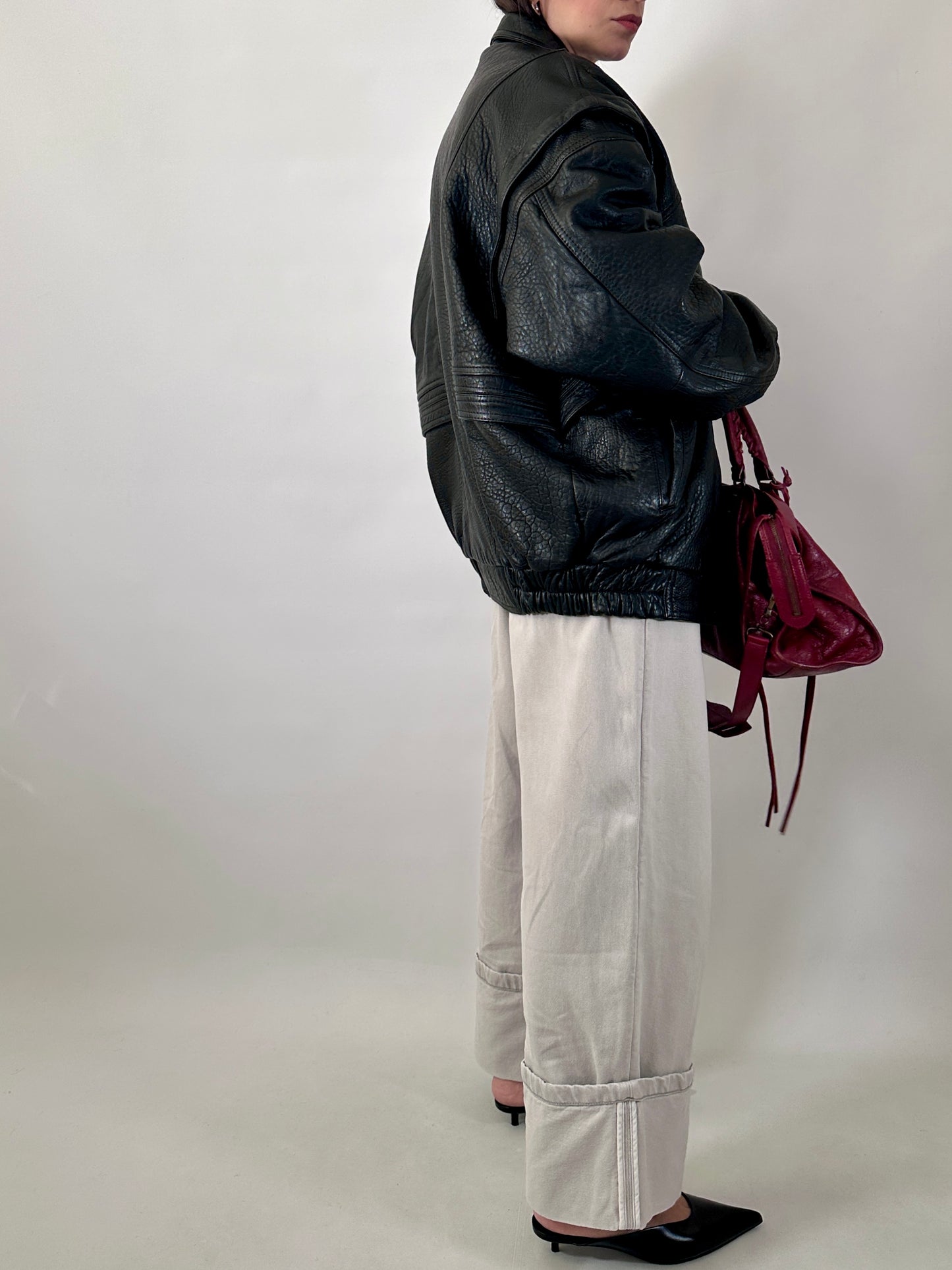 Vintage leather bomber jacket with detachable sleeves