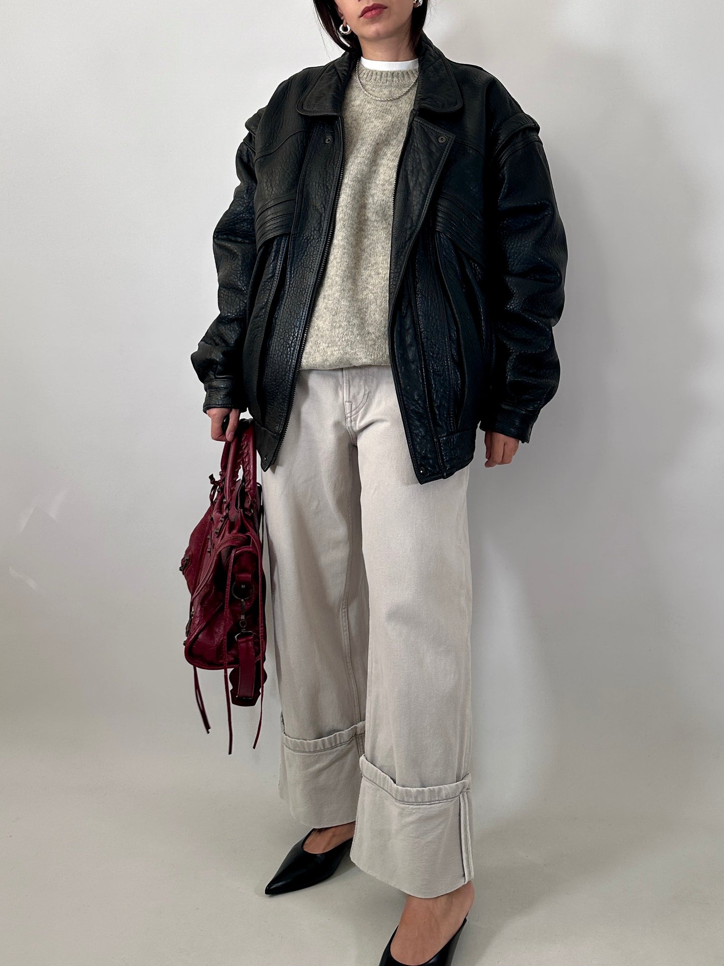 Vintage leather bomber jacket with detachable sleeves