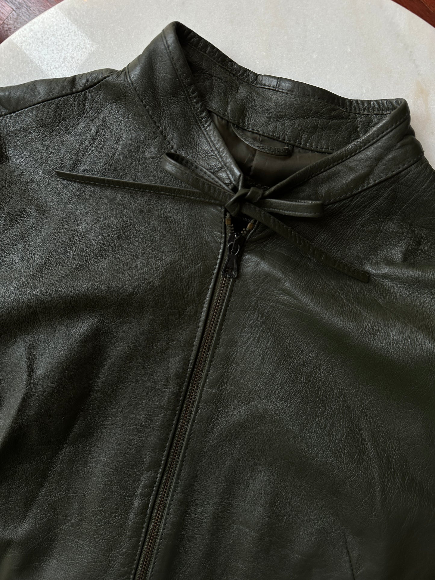 Bow detail vintage green leather jacket