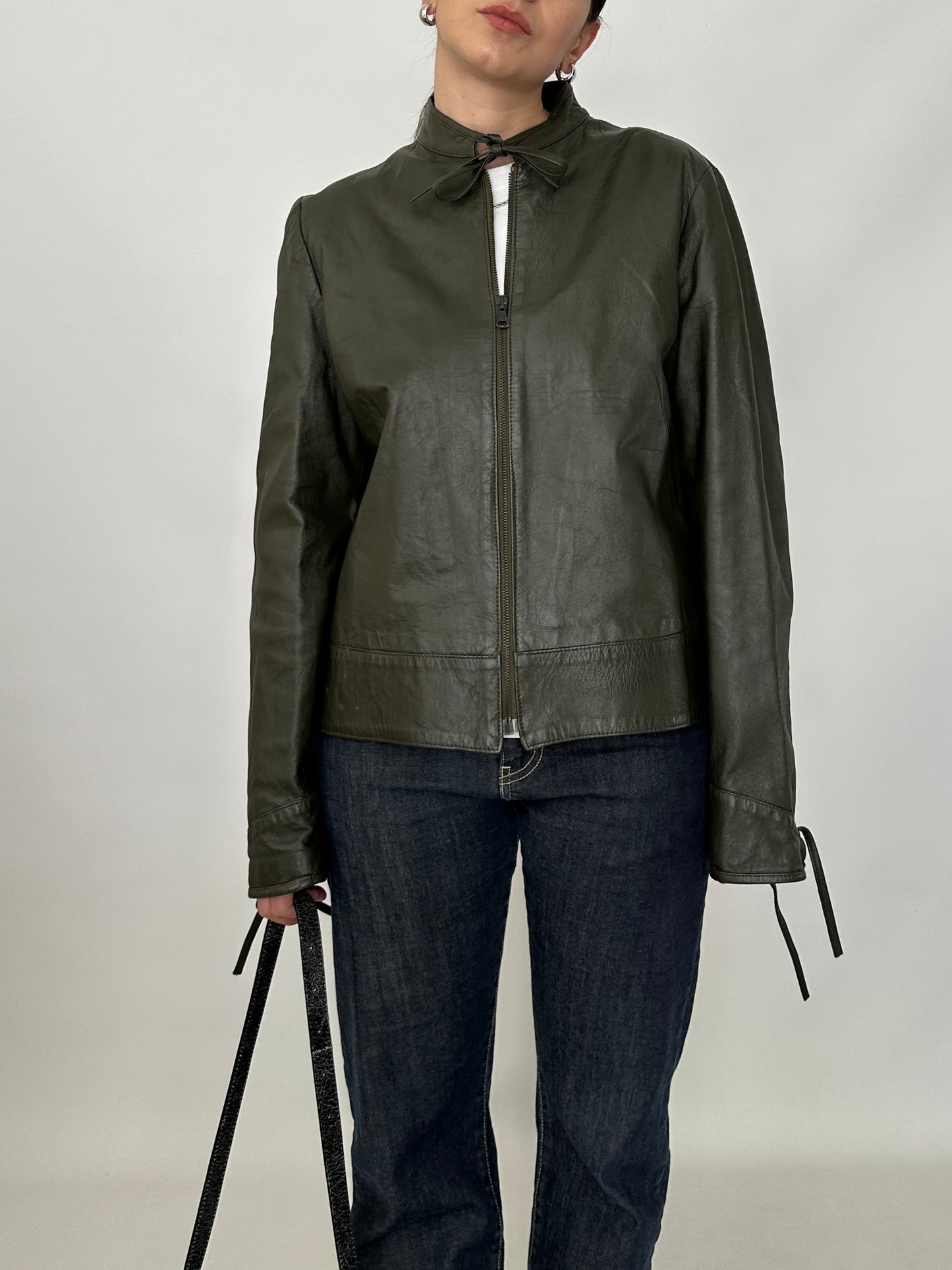 Bow detail vintage green leather jacket