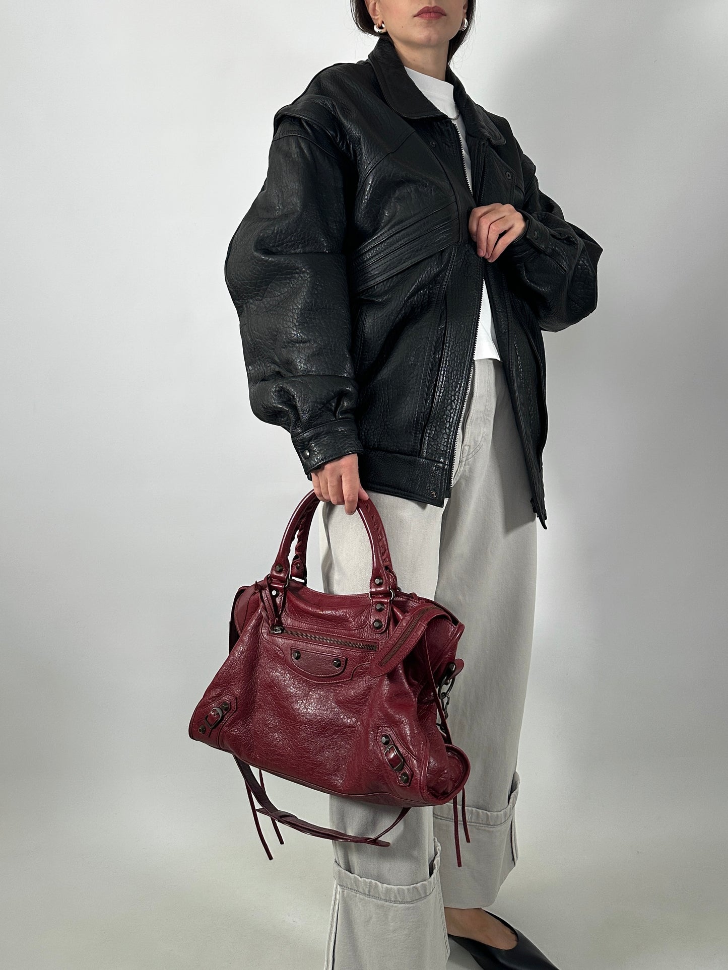 Vintage leather bomber jacket with detachable sleeves