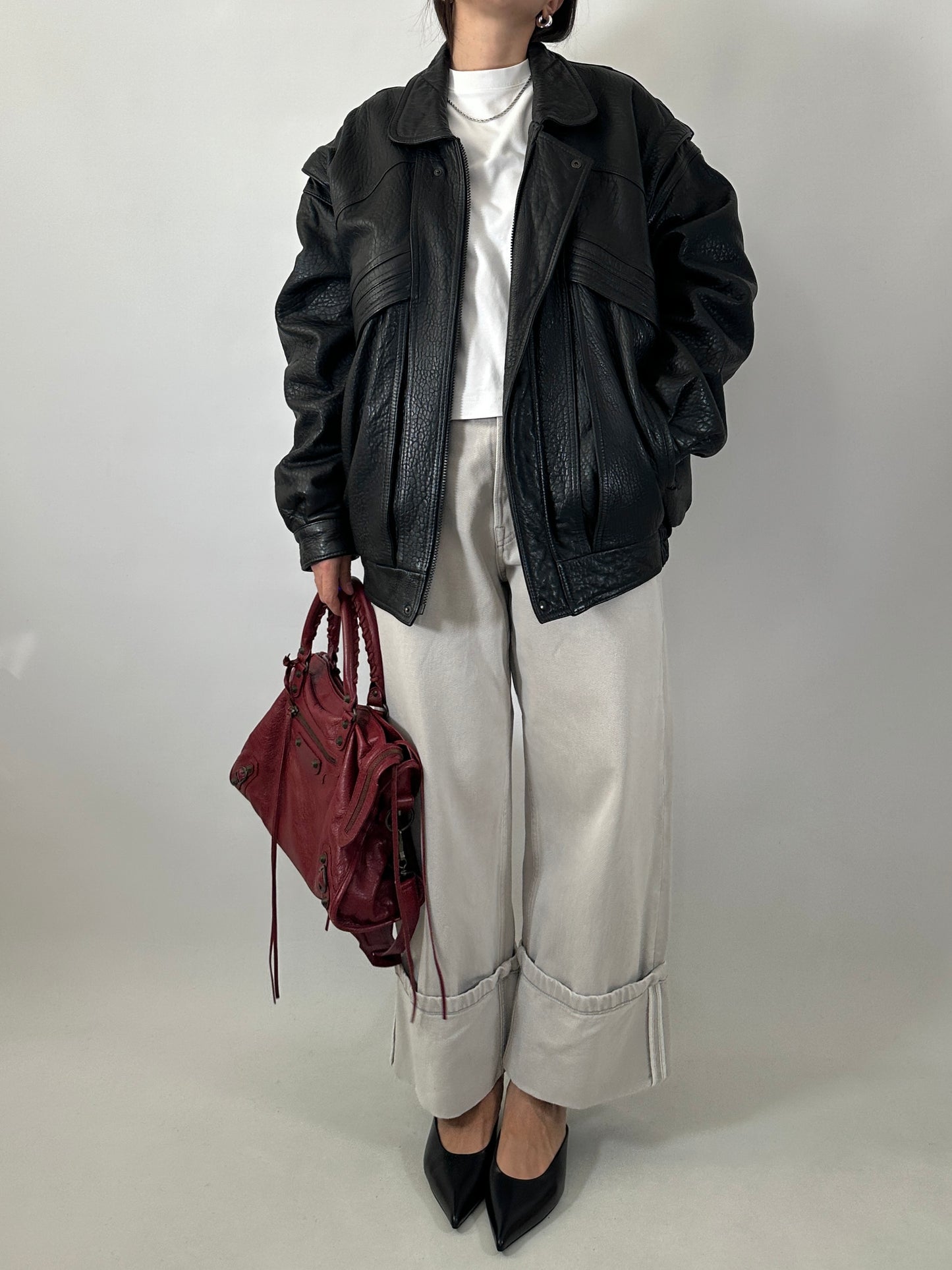 Vintage leather bomber jacket with detachable sleeves