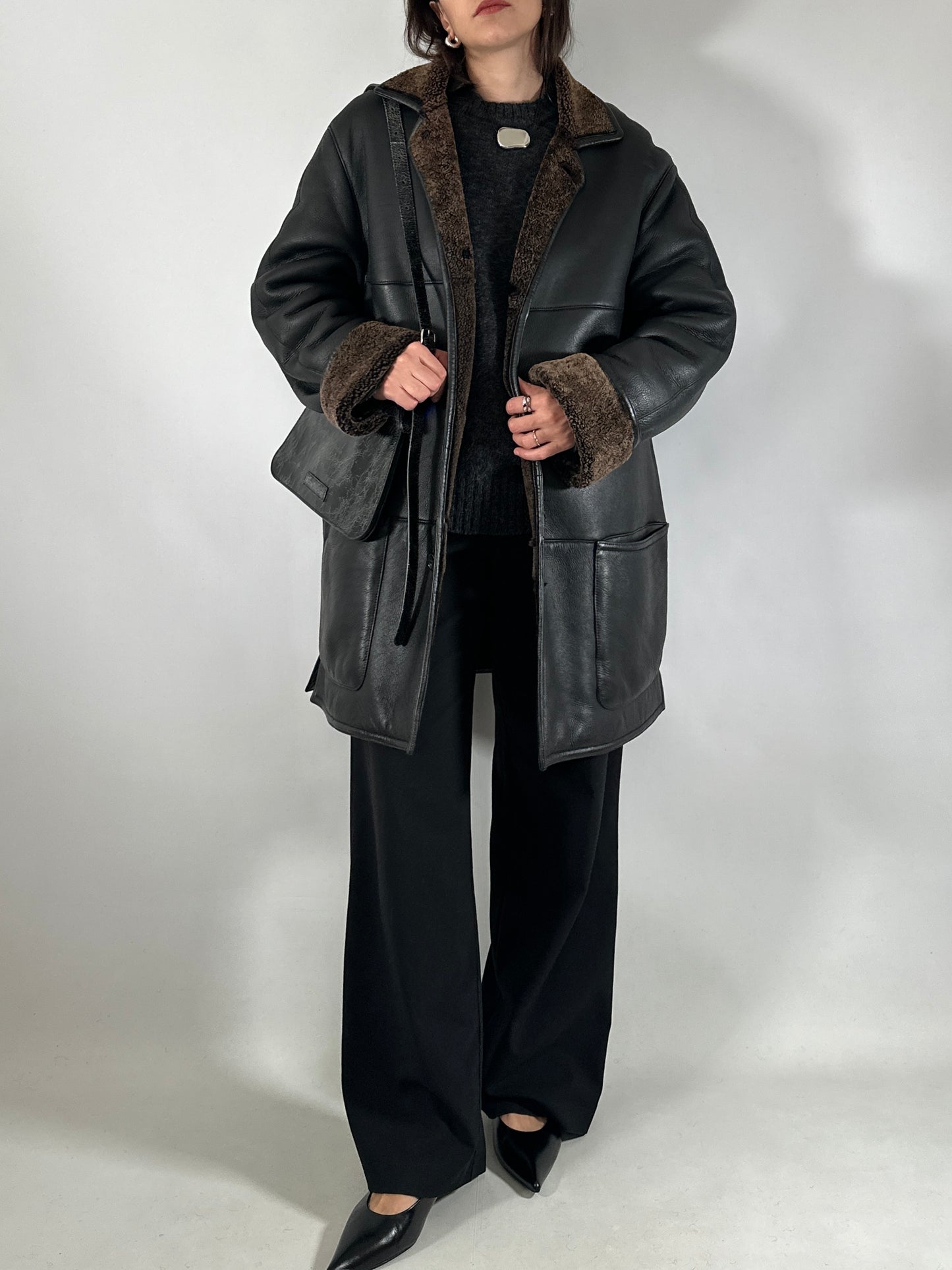 Authentic vintage shearling coat in black and brown