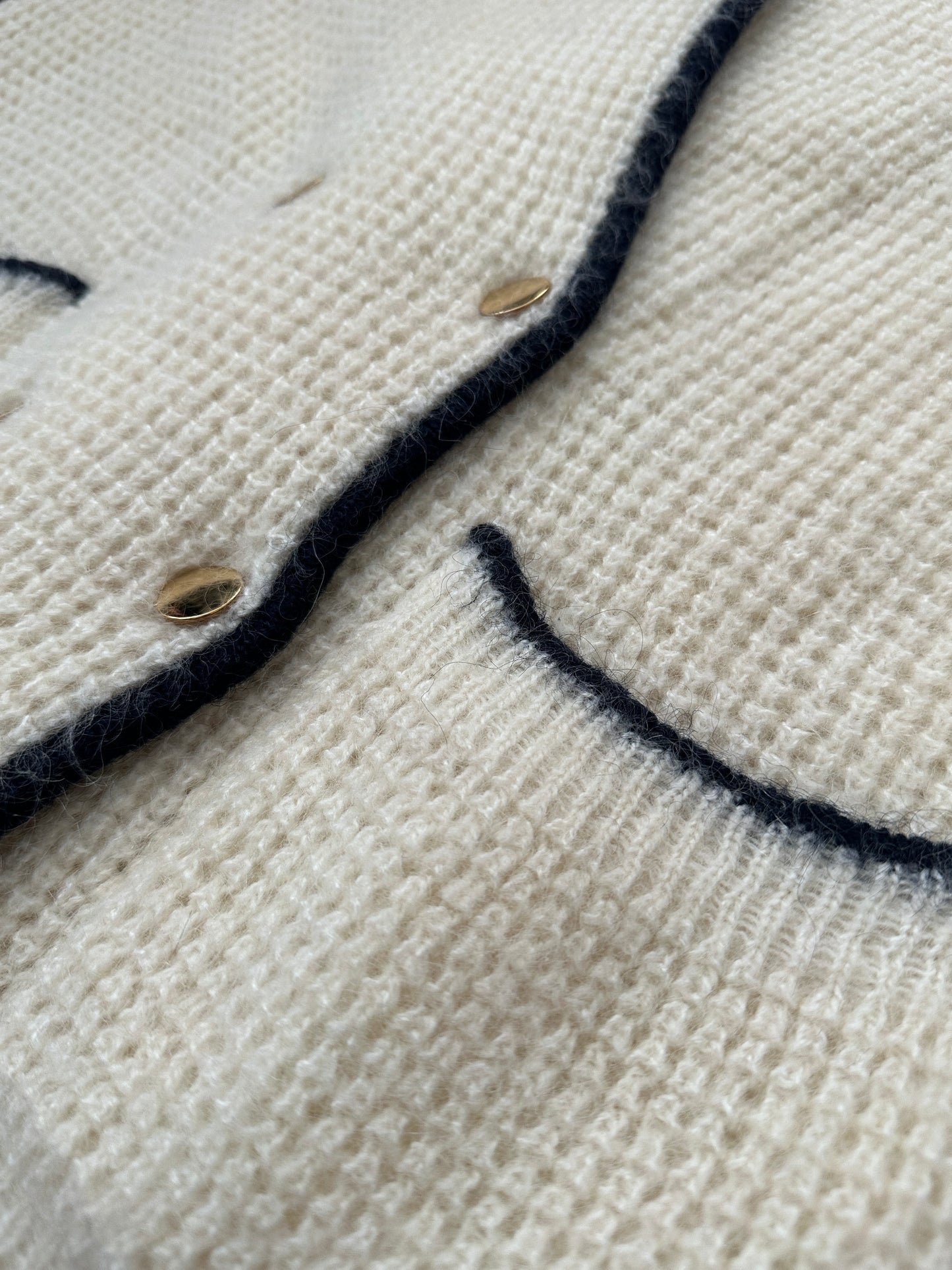 Double-breasted knitted jacket