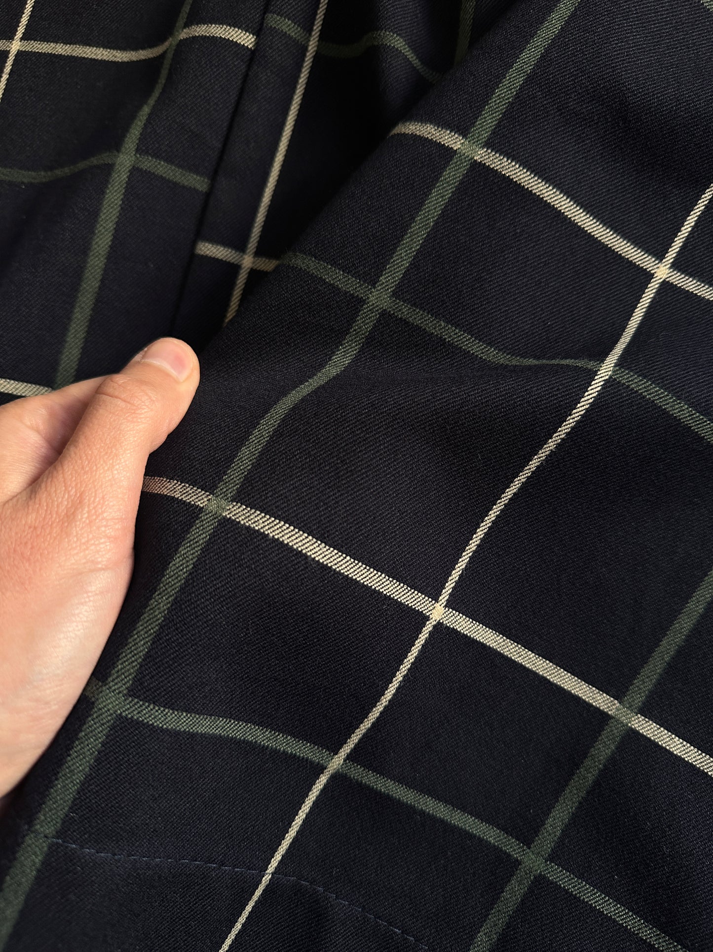 Checked pleated midi skirt