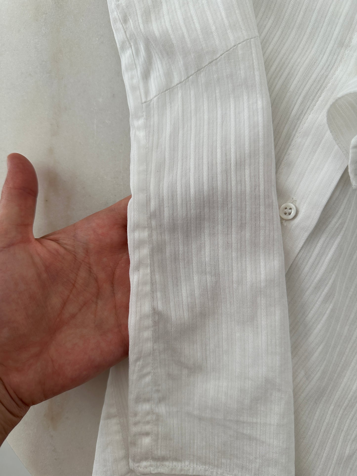 Ferré white blouse with asymmetric ruffle detail