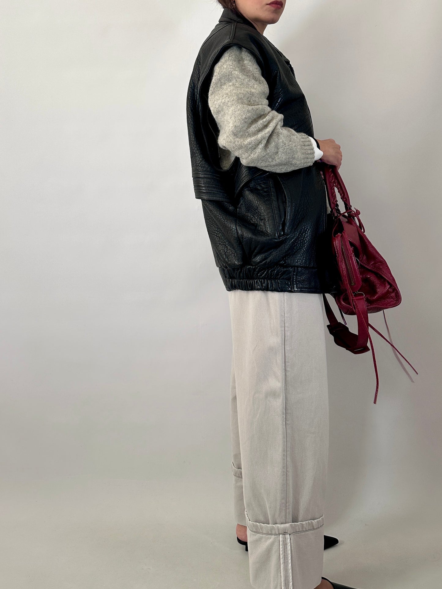 Vintage leather bomber jacket with detachable sleeves