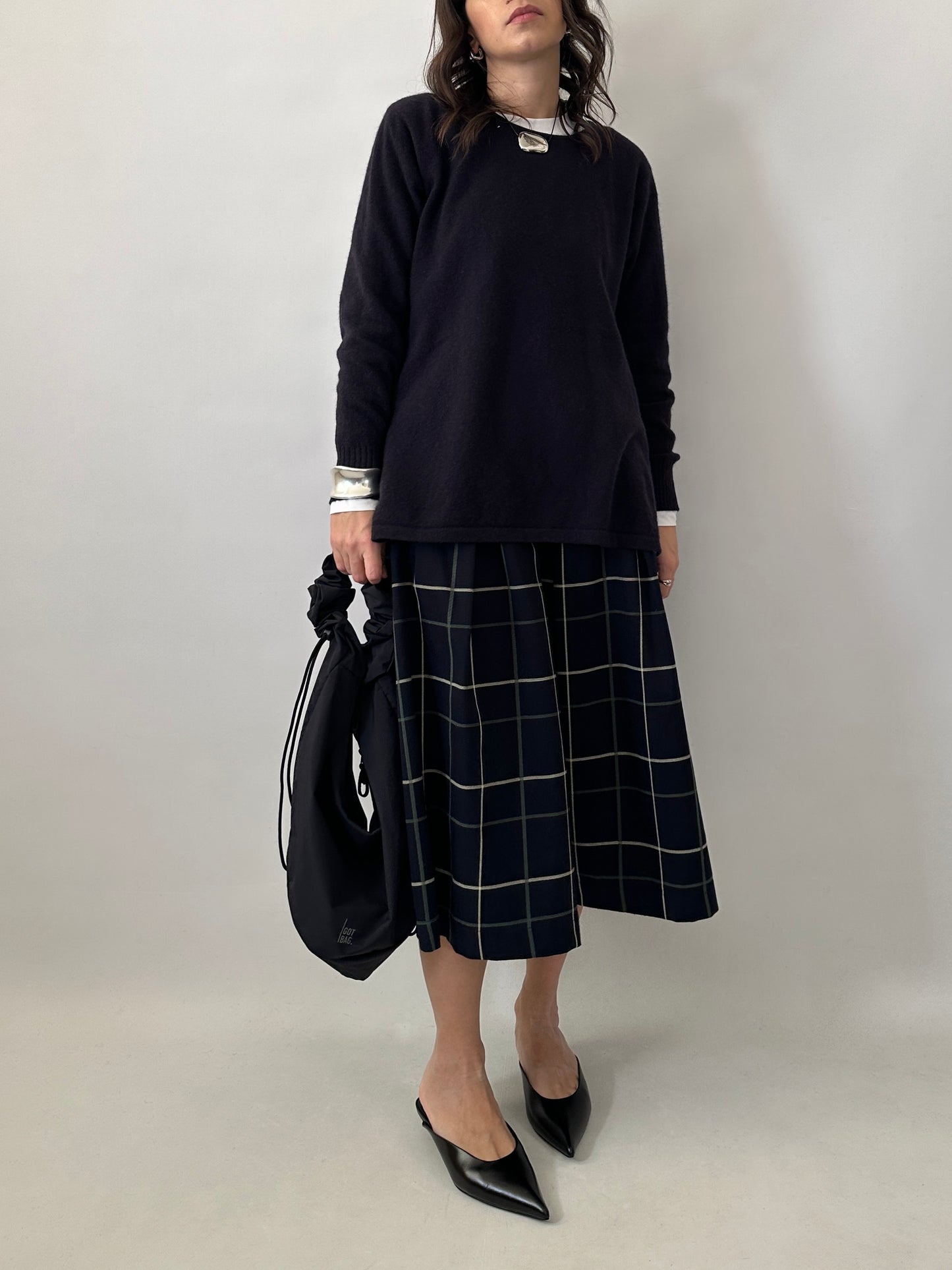 Checked pleated midi skirt