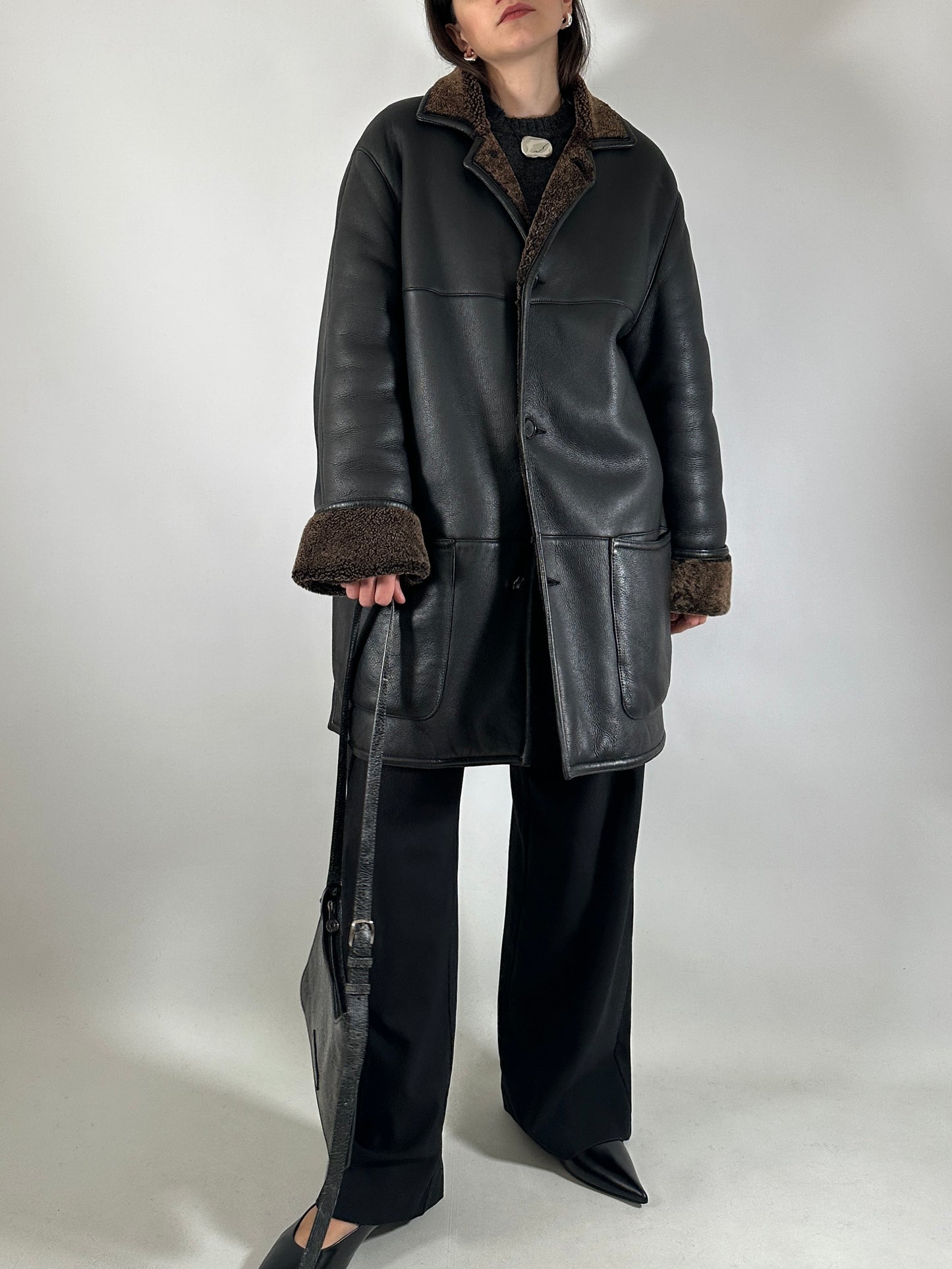 Authentic vintage shearling coat in black and brown