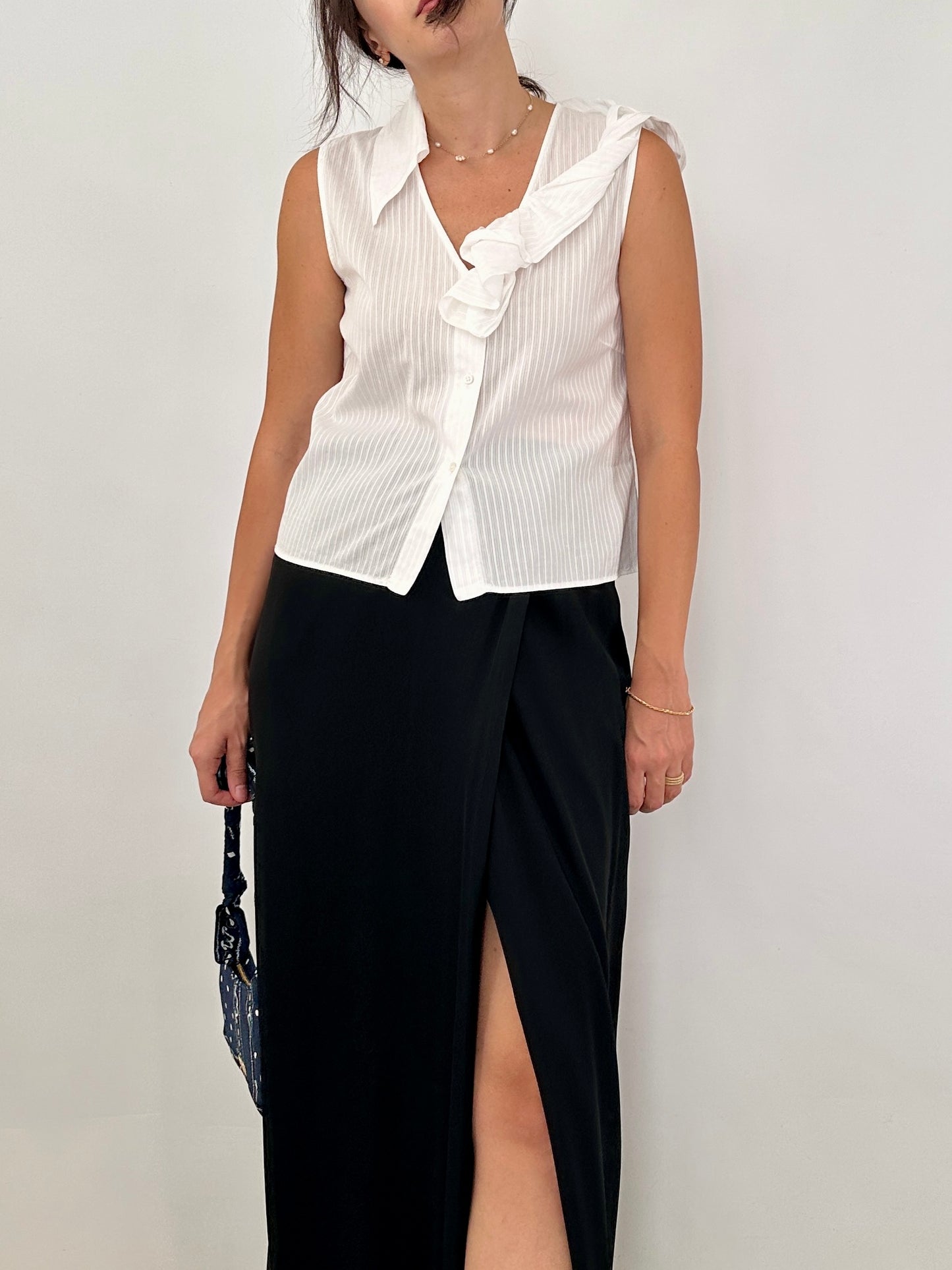 Ferré white blouse with asymmetric ruffle detail