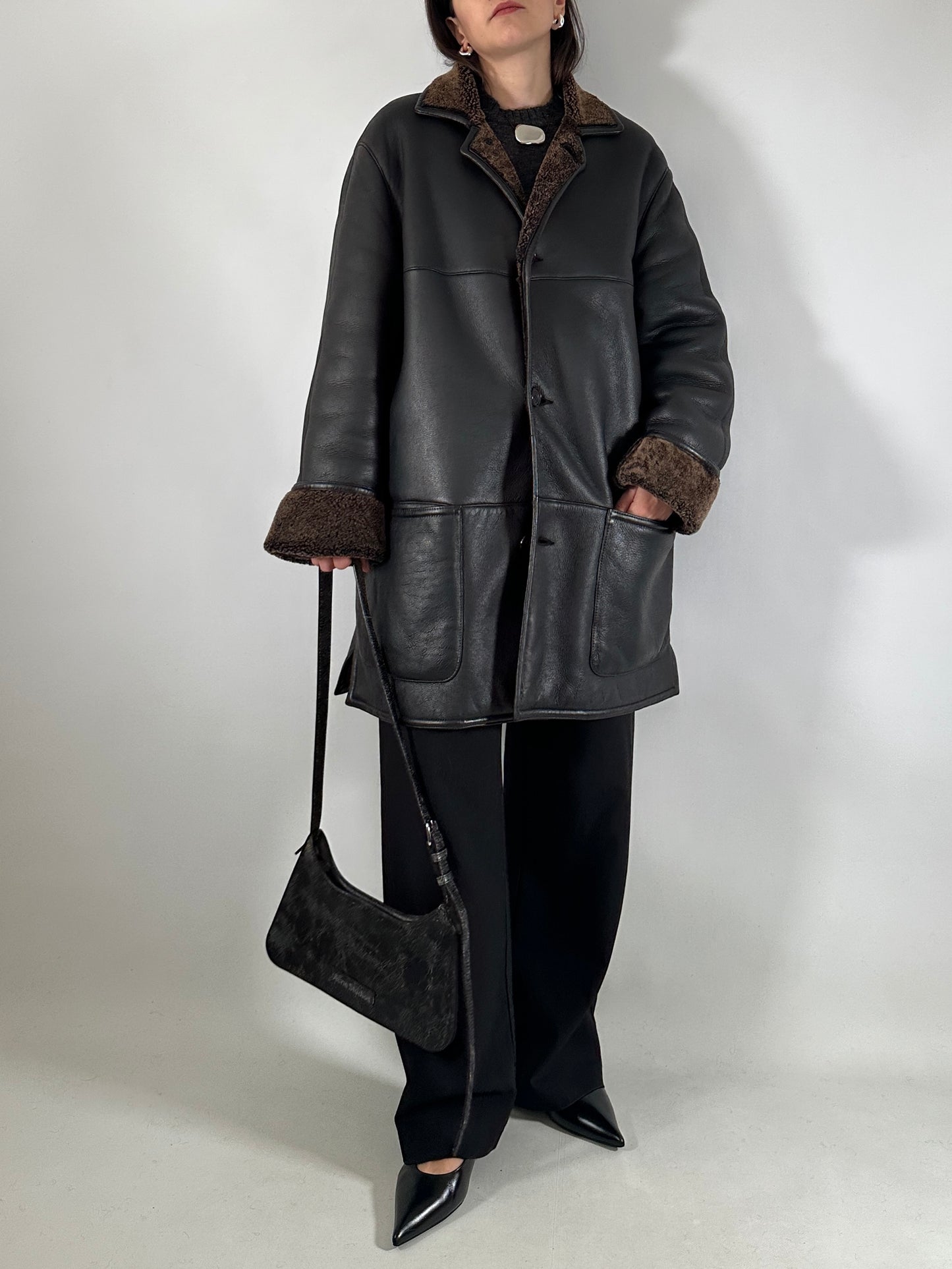 Authentic vintage shearling coat in black and brown