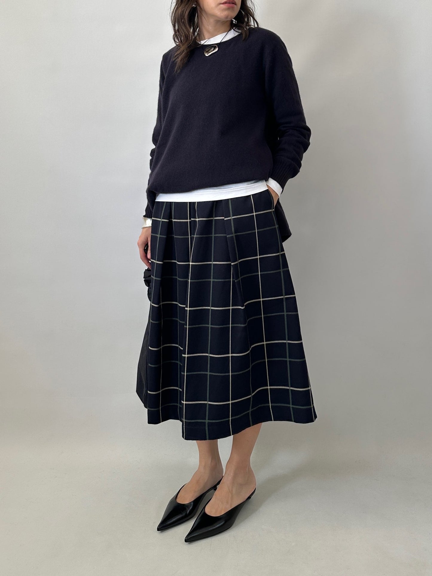 Checked pleated midi skirt