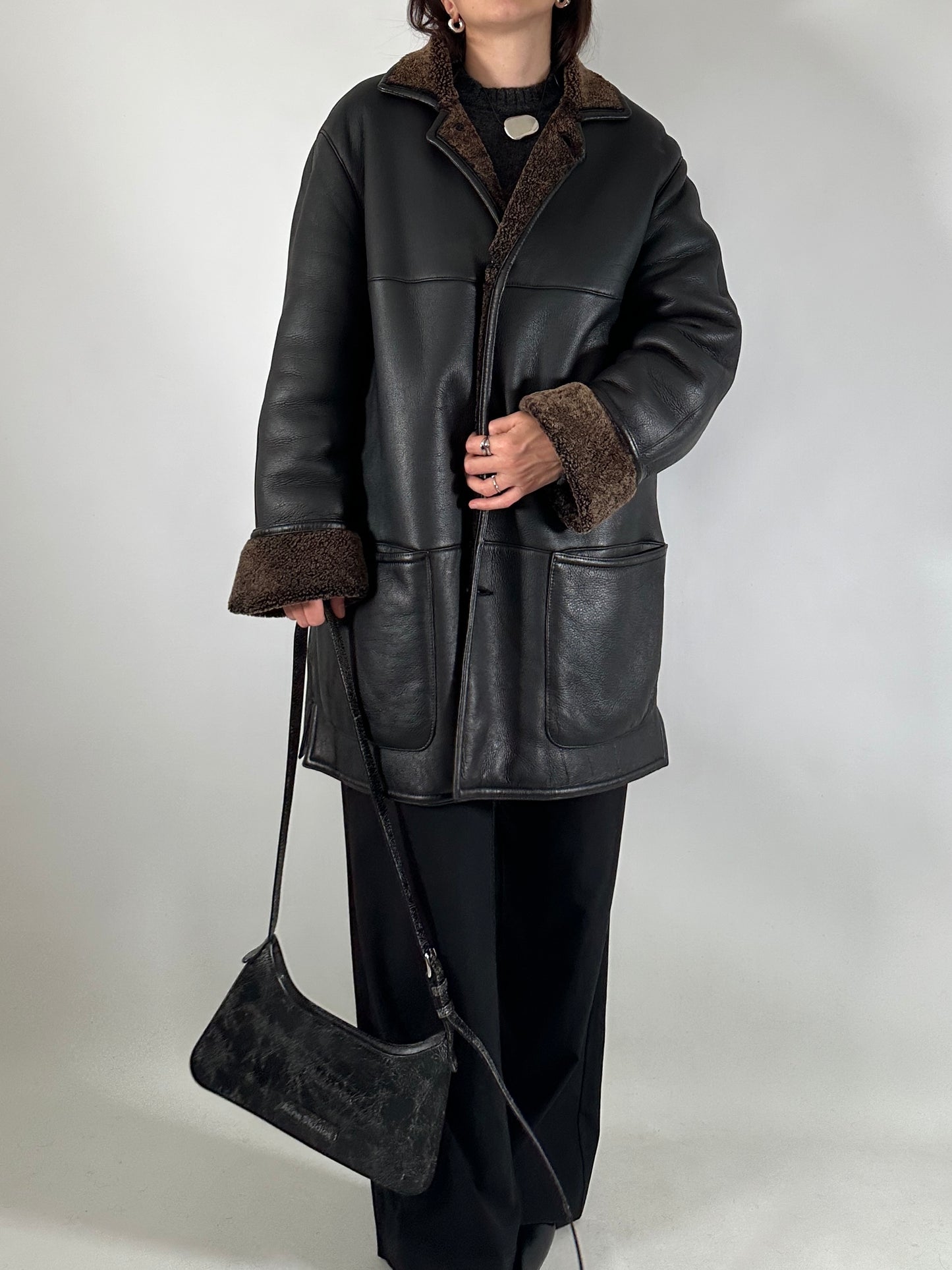 Authentic vintage shearling coat in black and brown