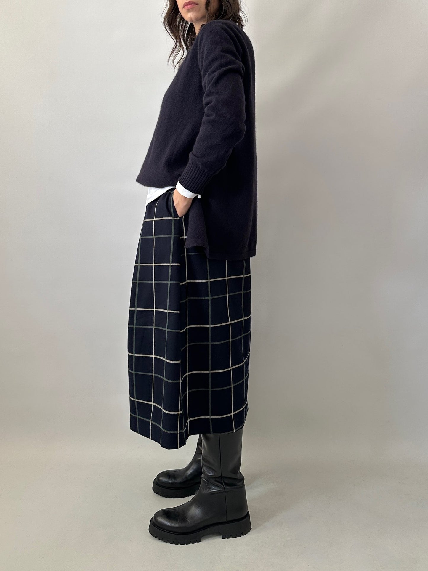 Checked pleated midi skirt