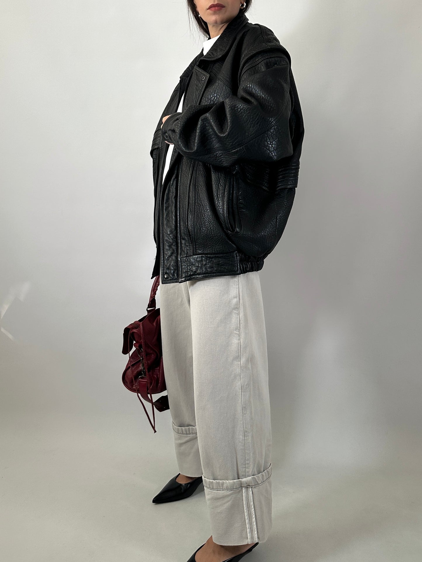 Vintage leather bomber jacket with detachable sleeves