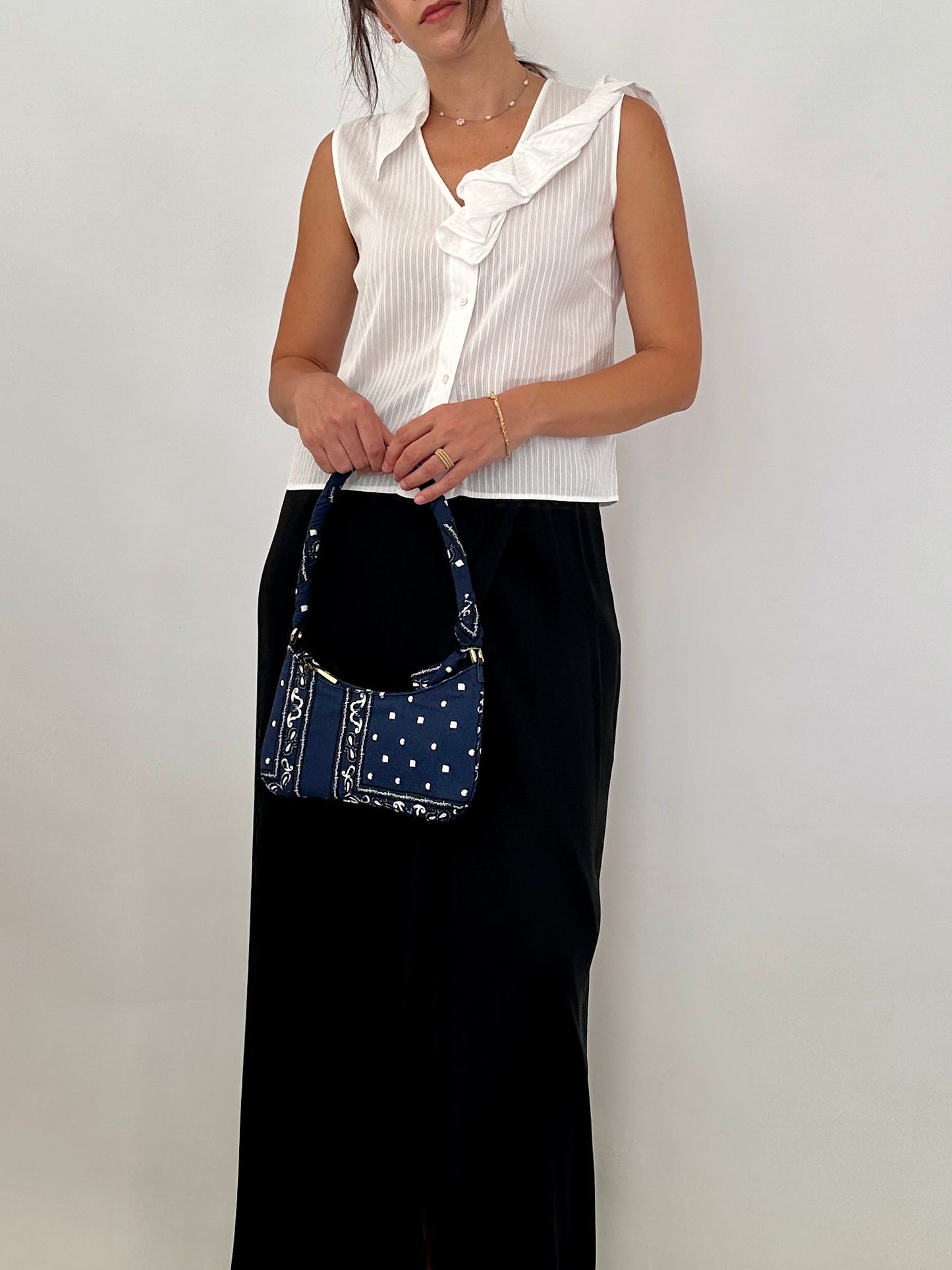 Ferré white blouse with asymmetric ruffle detail