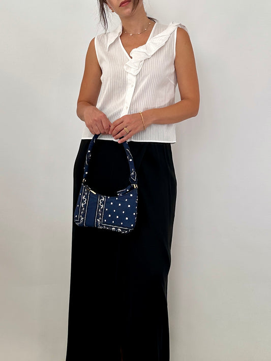 Ferré white blouse with asymmetric ruffle detail