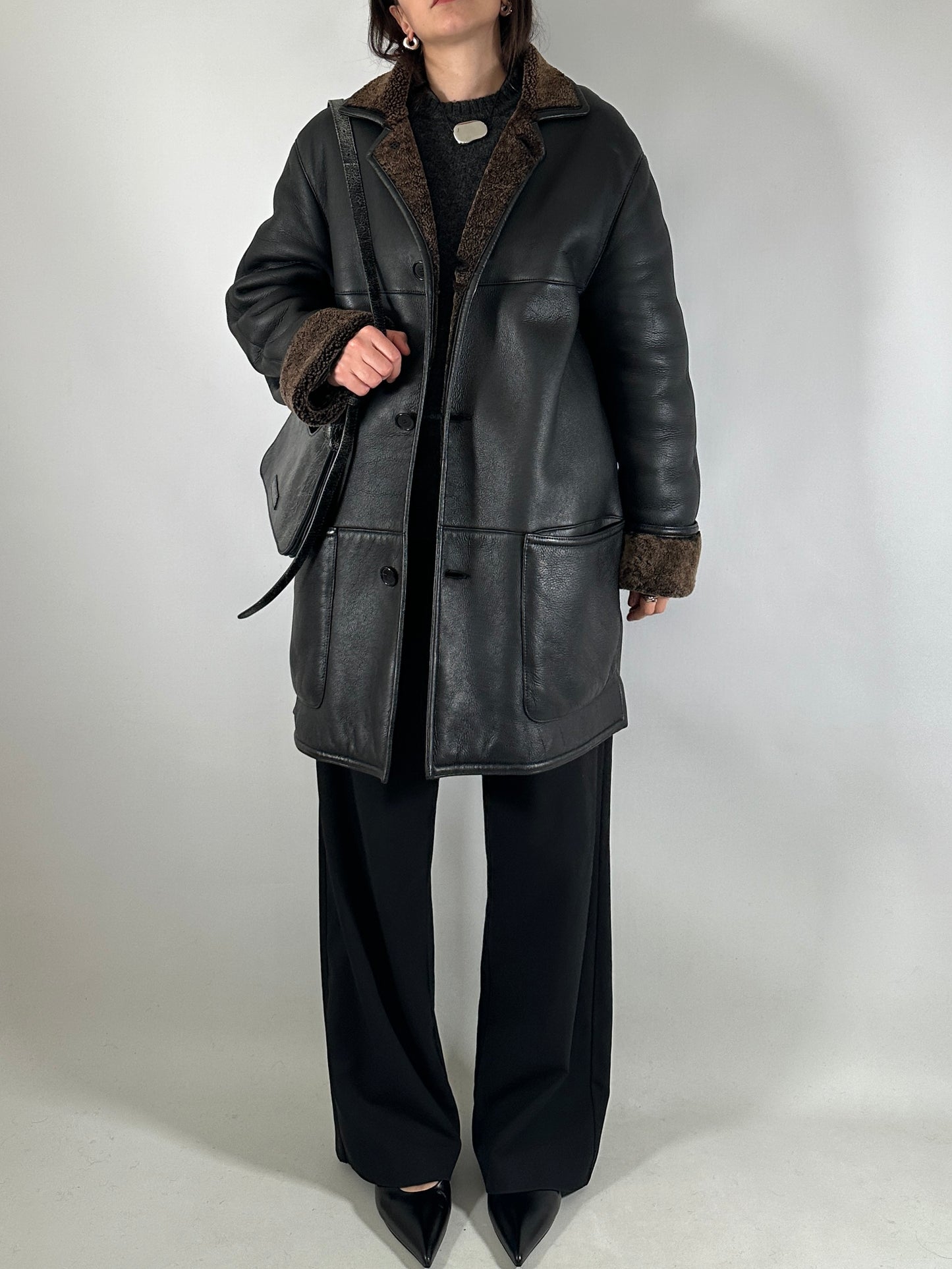 Authentic vintage shearling coat in black and brown