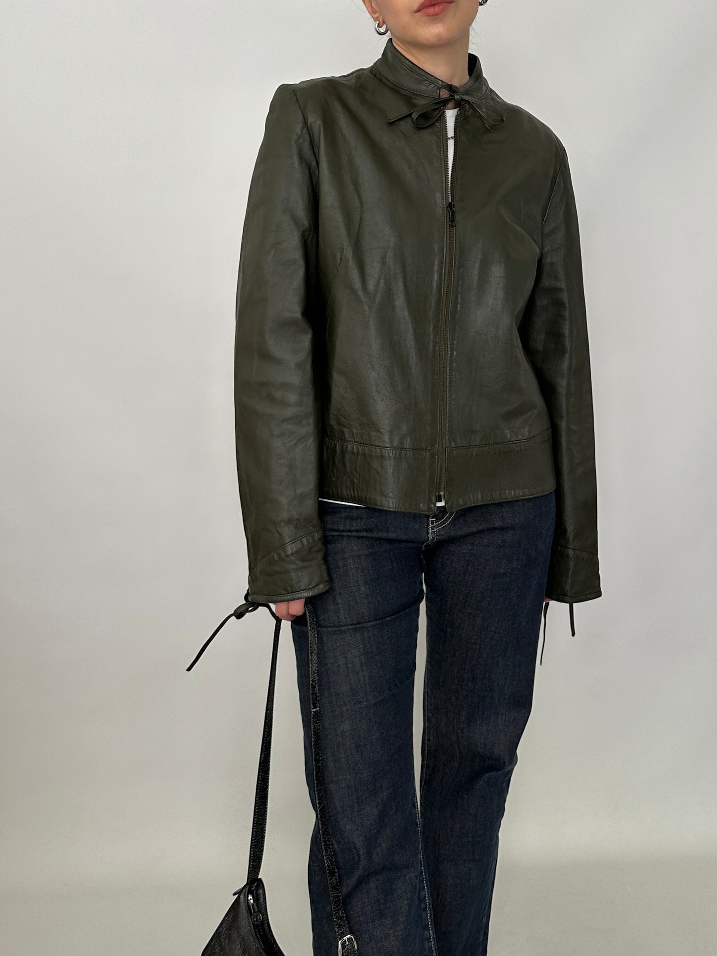 Bow detail vintage green leather jacket