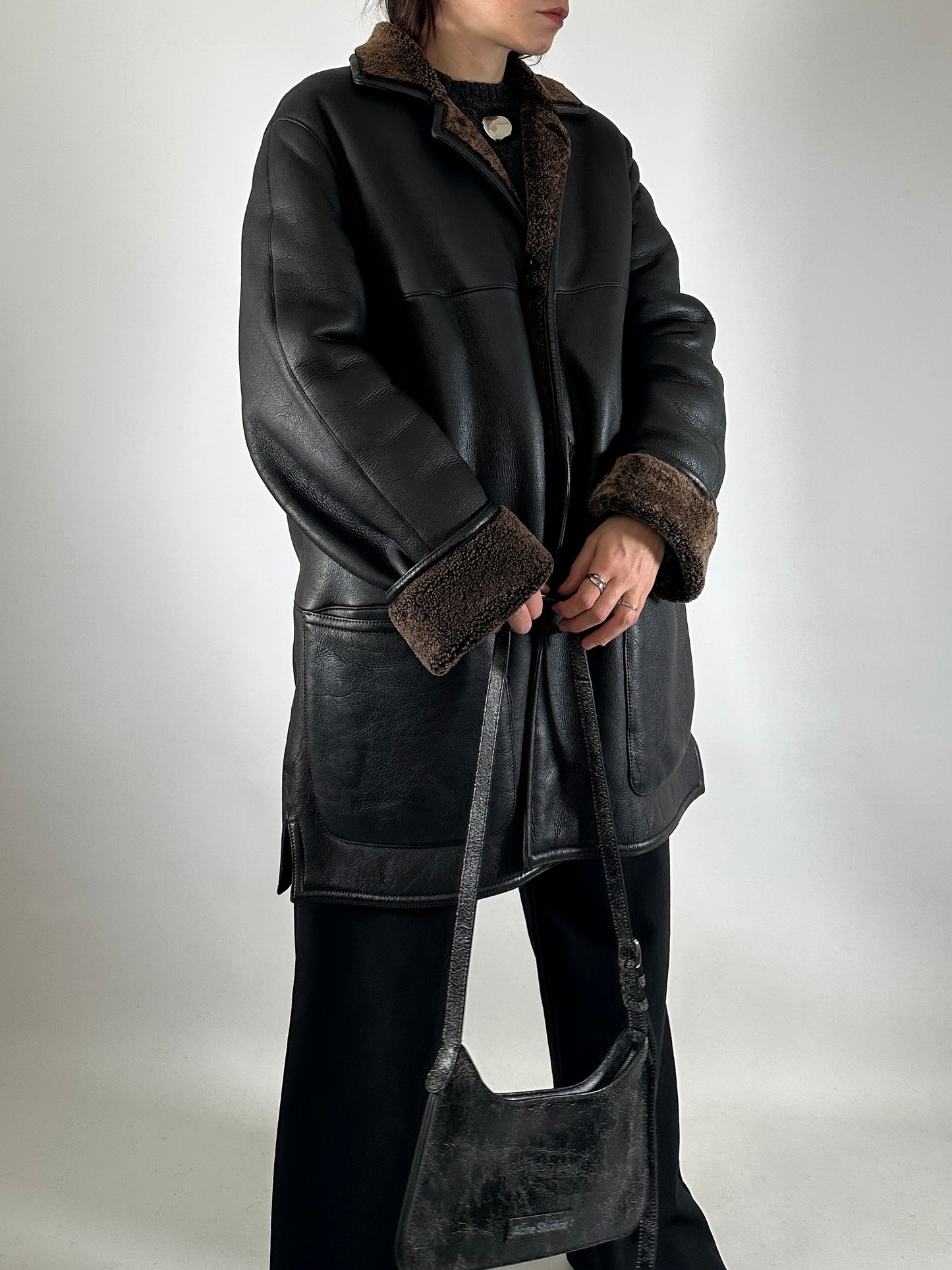 Authentic vintage shearling coat in black and brown