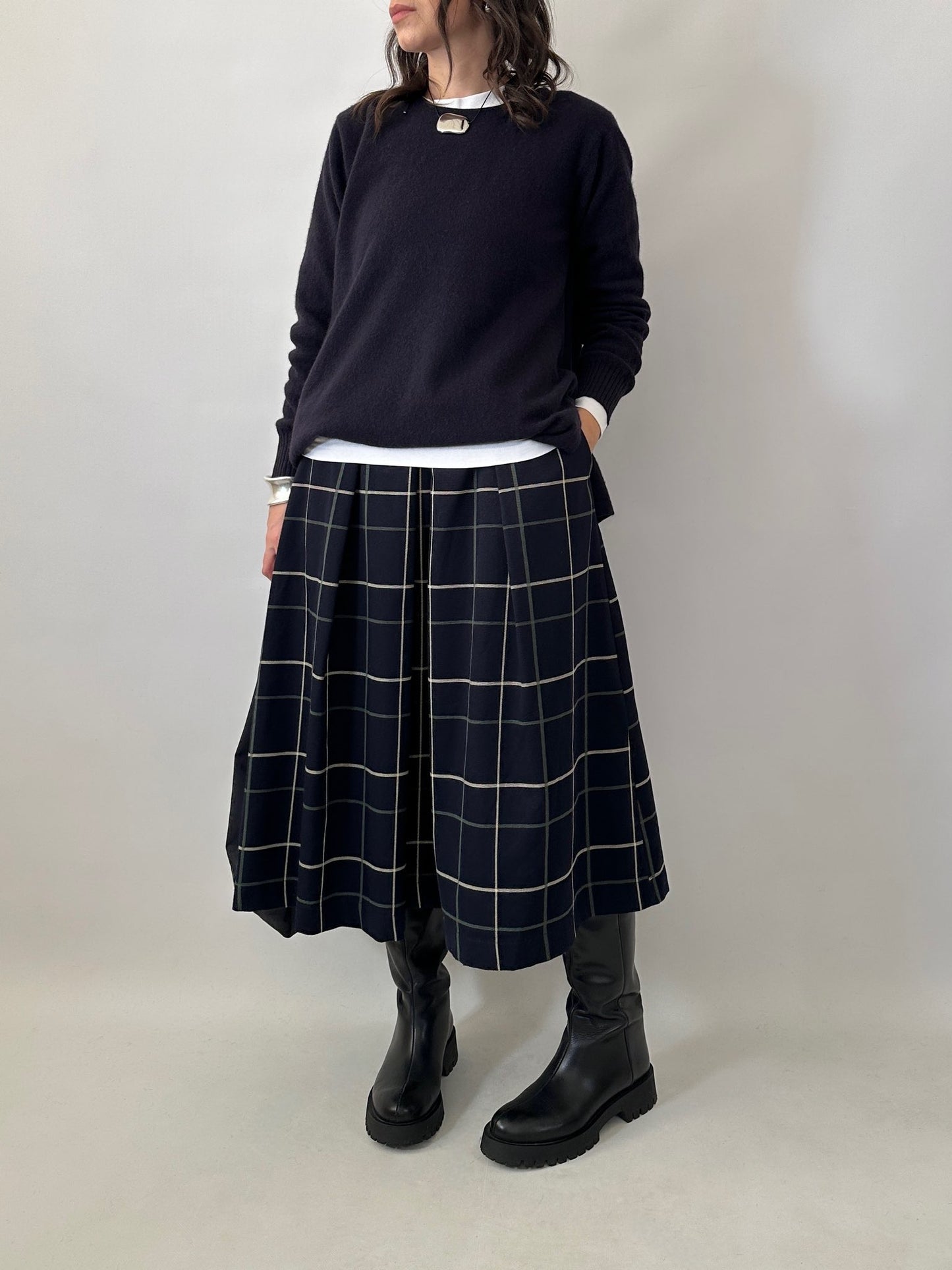 Checked pleated midi skirt